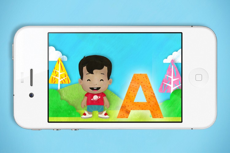 A white iPhone displays a cartoon boy with dark hair, wearing a red shirt with a white cloud and star design, smiling and standing on a grassy area. The large orange letter "A" appears to the right of the boy. Behind him are stylized trees in yellow and pink, against a light blue sky with clouds. The background is solid light blue.