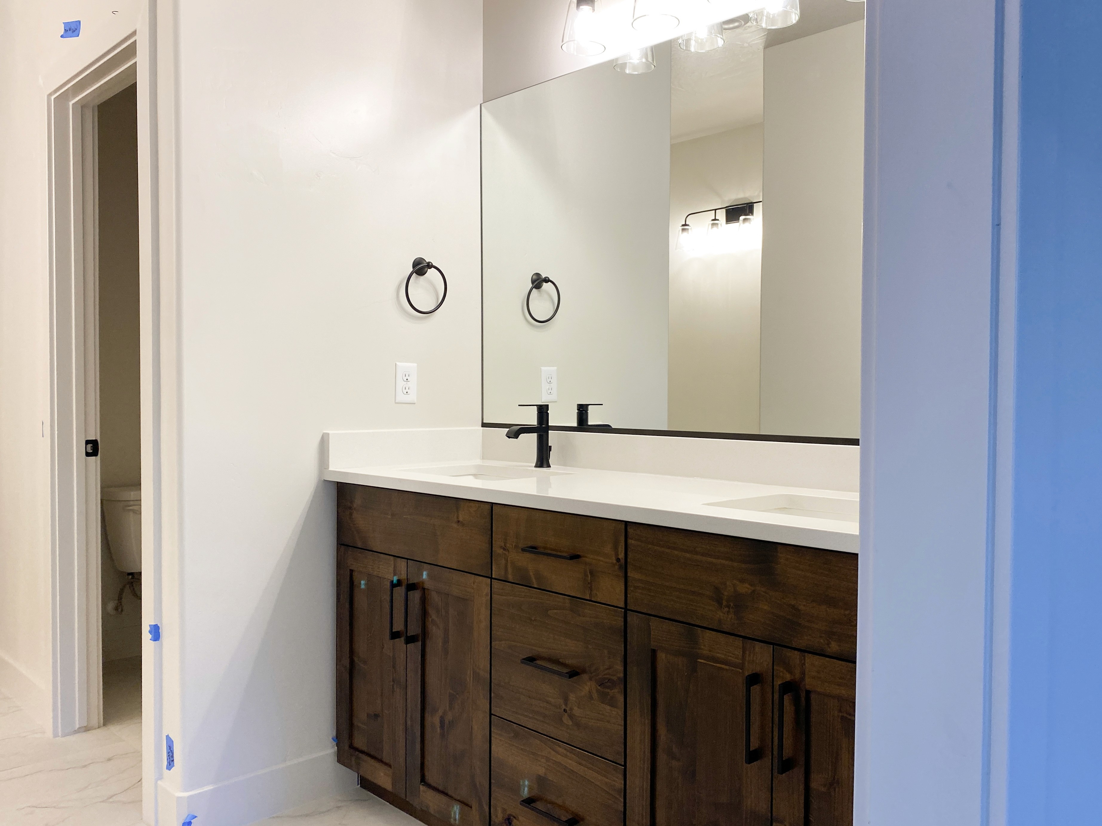 Primary bathroom in a Hurricane, Utah duplex home with simple and practical design.