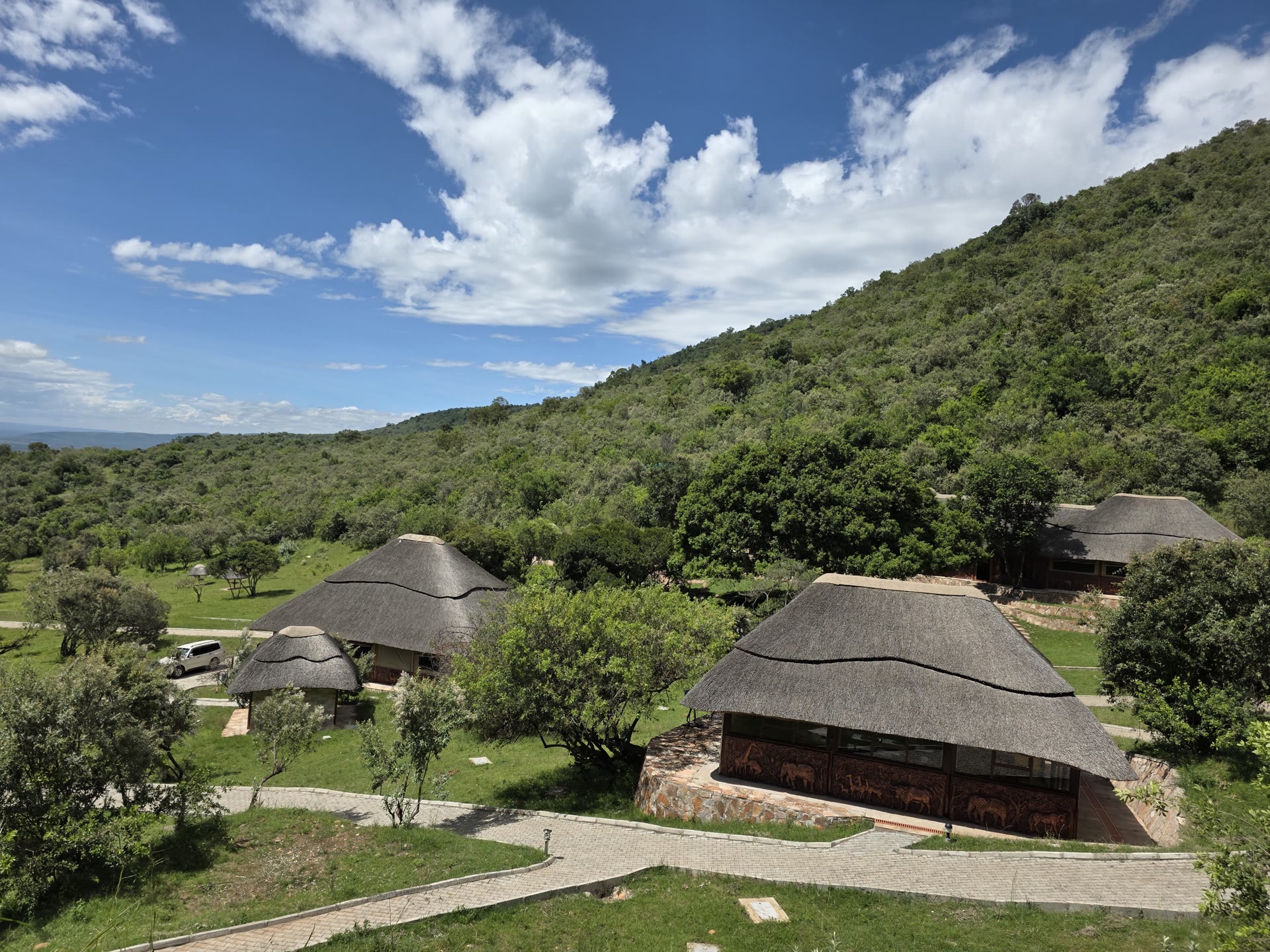 Lilita Keper camp beneath green hills
