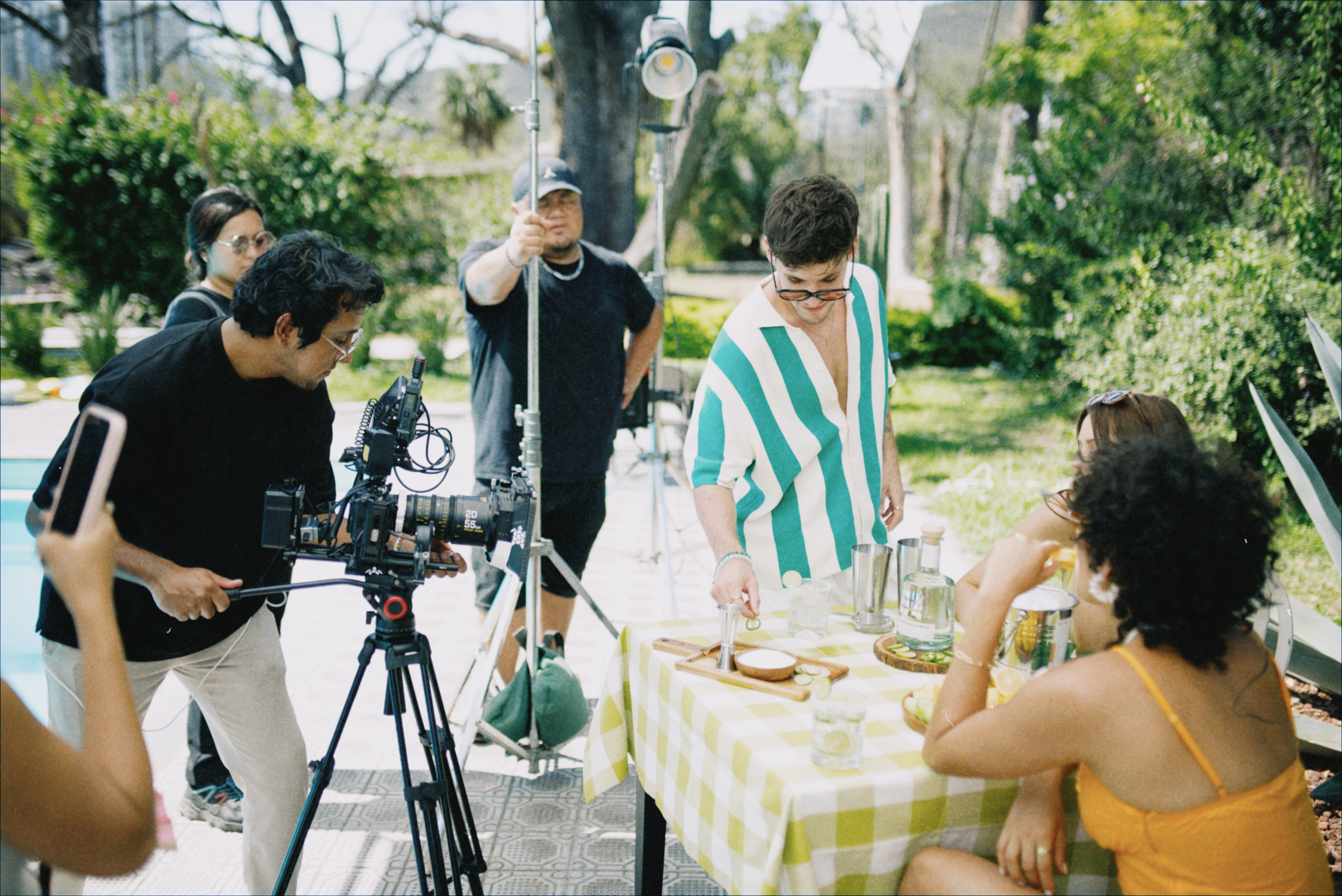 Mike Bautista on set for Vinoteca, shaping shadows and light to ensure every frame has something true to reveal.