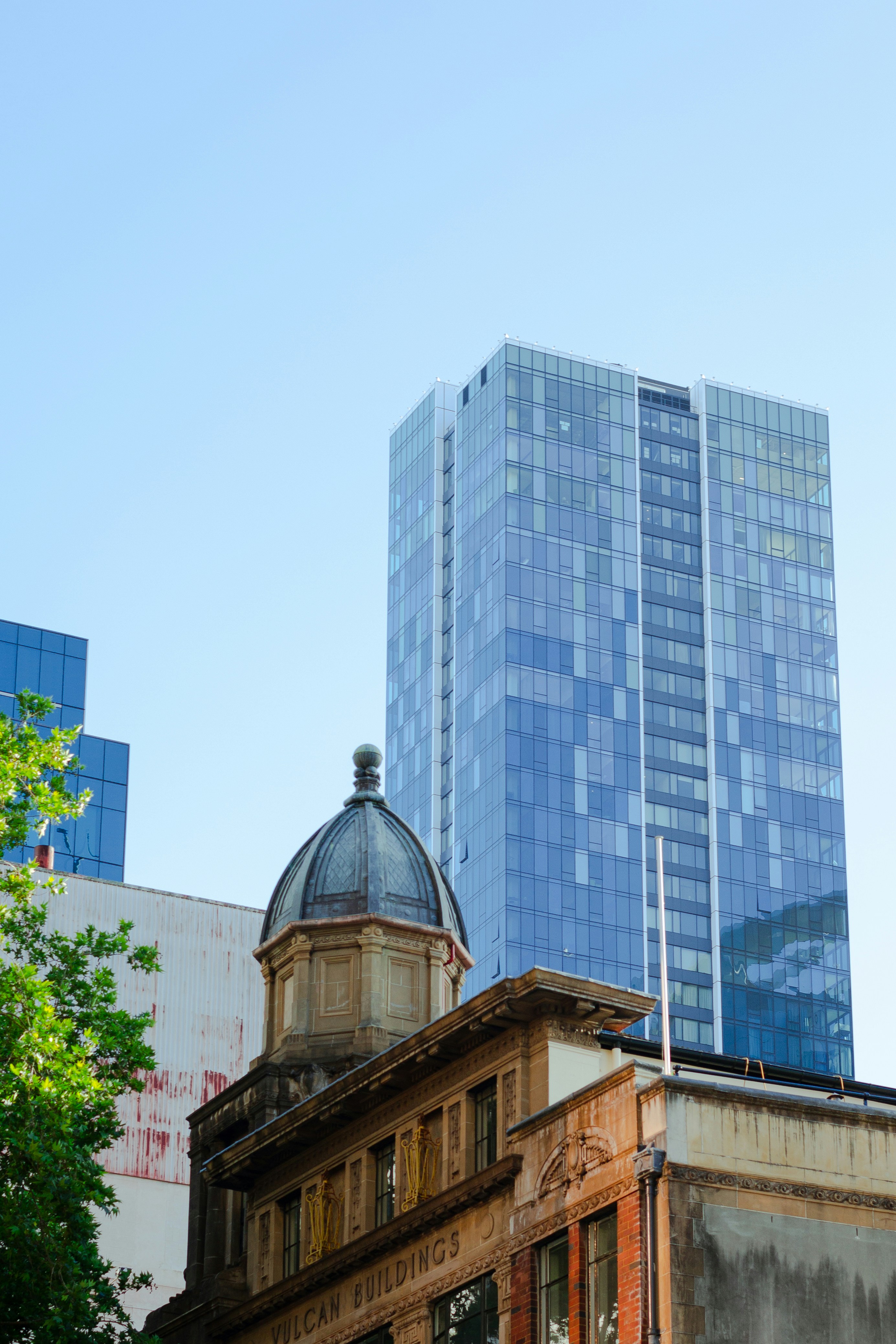 people standing inside city building