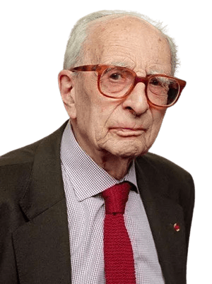 A portrait of an elderly man with large, distinctive glasses, wearing a suit, checkered shirt, and red tie. His serious expression and refined attire convey wisdom and intellectual authority, suggesting he is a distinguished academic or professional figure. The setting appears formal, with a subdued background adding to the dignified tone.