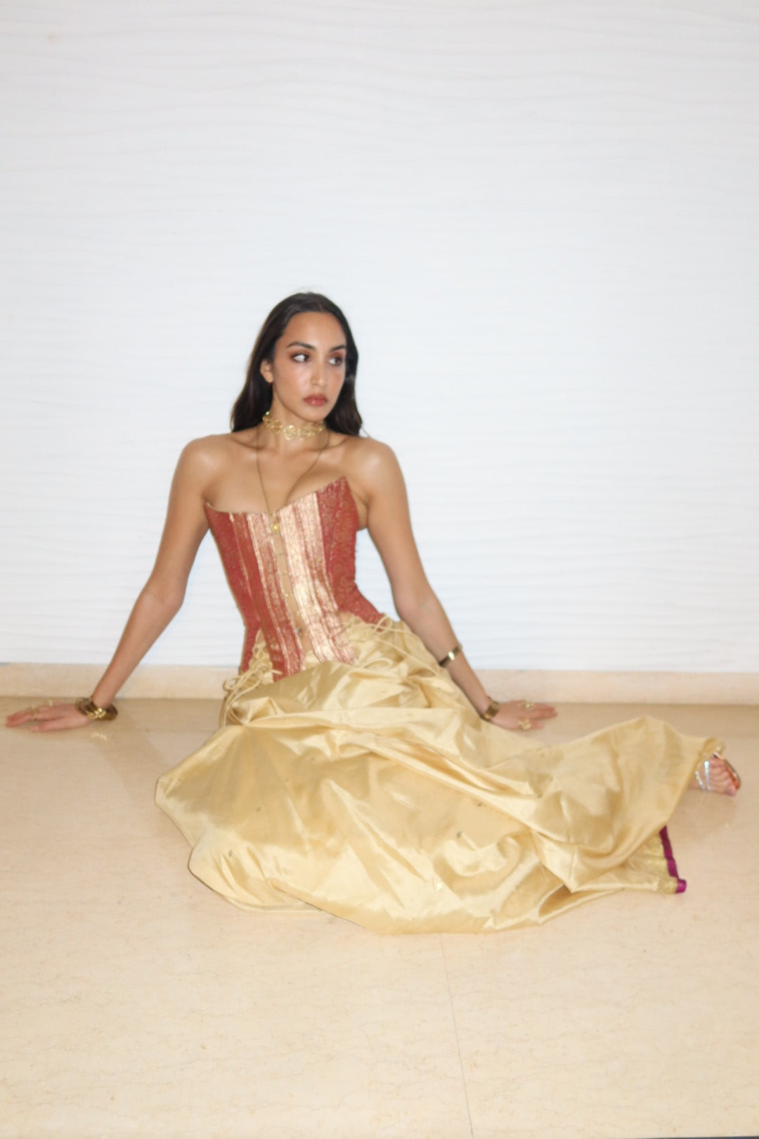 Raina is our one-of-a-kind four-panel corset, handcrafted in-house using a vintage silk saree.