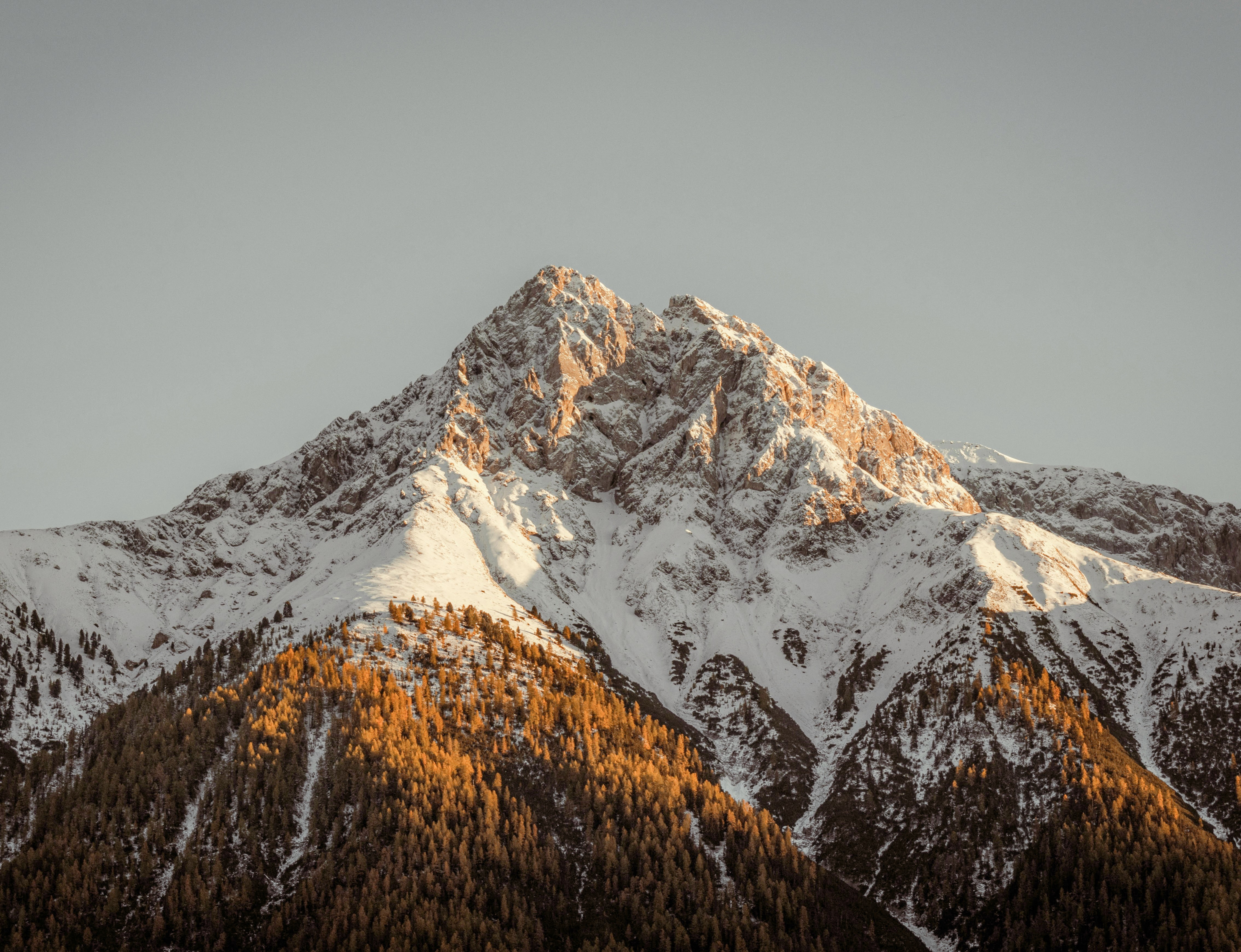 Mountain with rocky peaks under the sky
