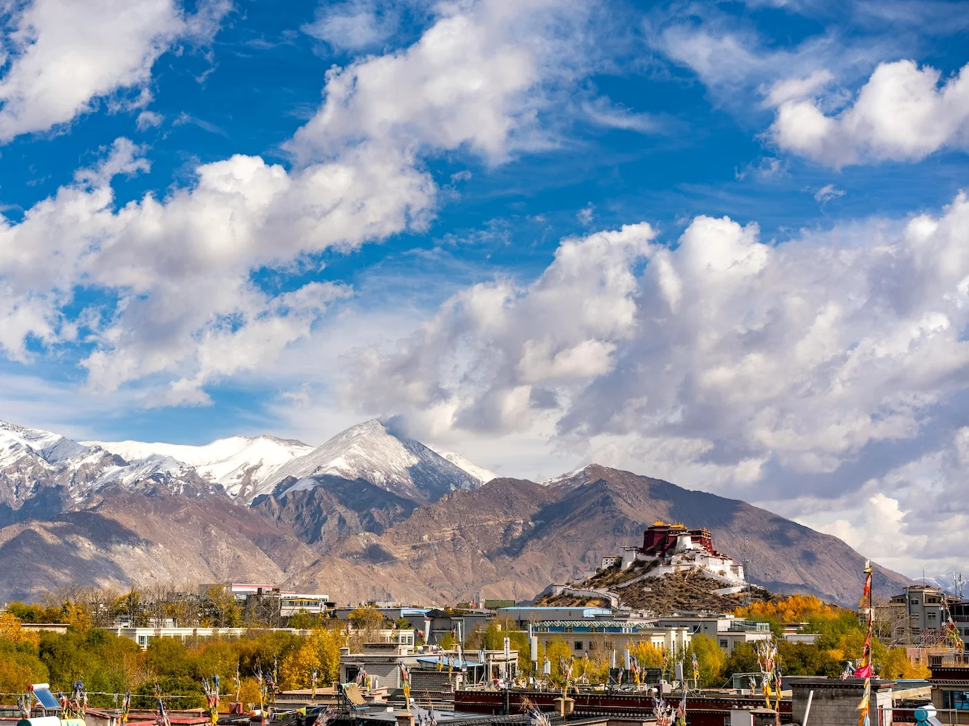 Lhasa skyline with Potala Palace in background on a sunny day