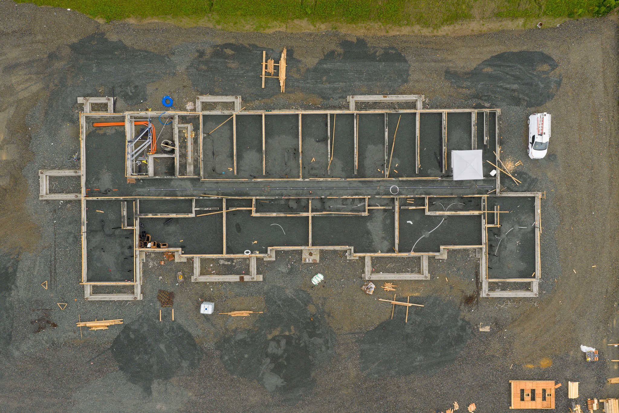 Aerial view of a construction site in Agassiz, Fraser Valley, British Columbia for HVAC and plumbing.