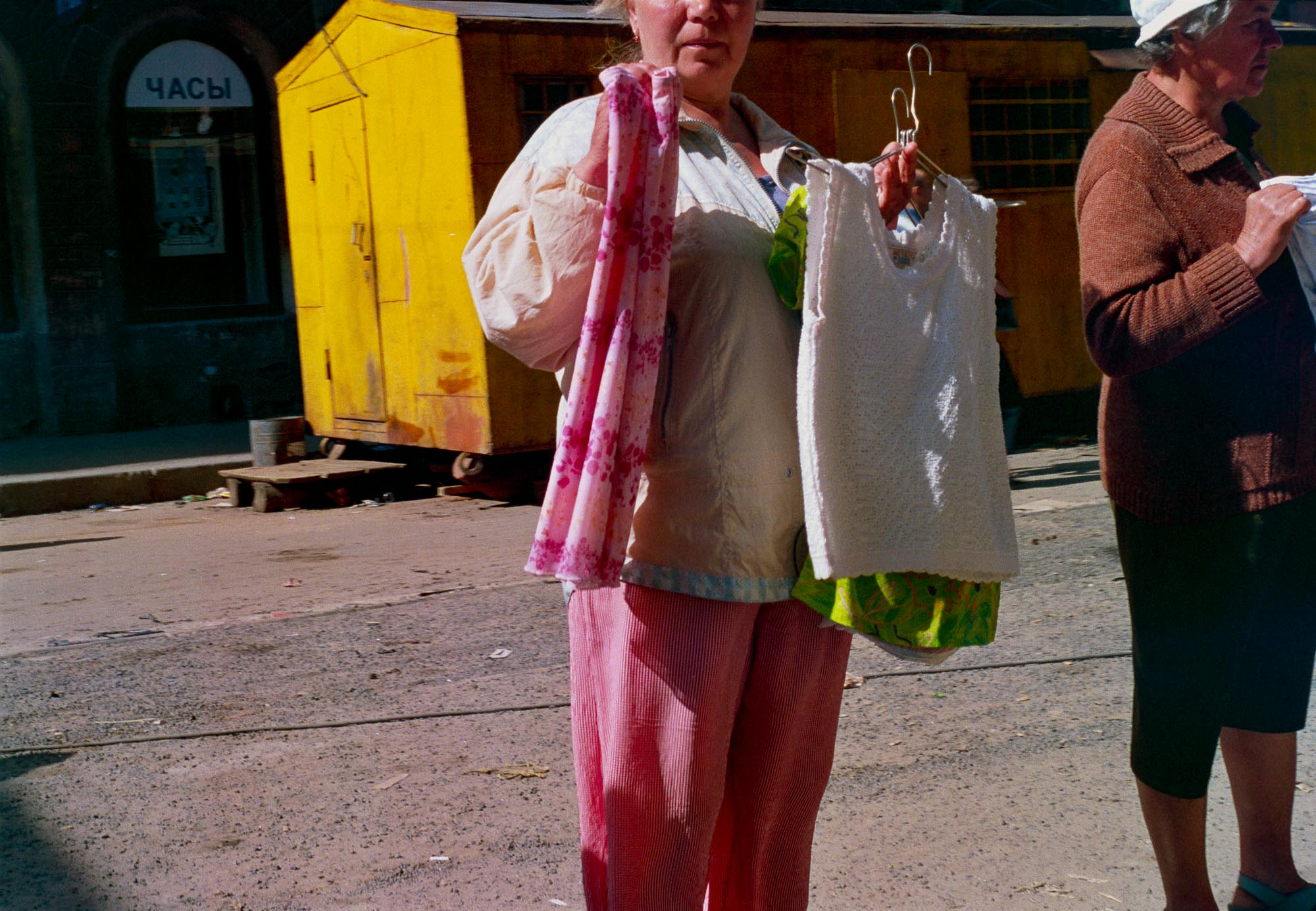 Women selling their clothes II, St. Petersburg, 2001