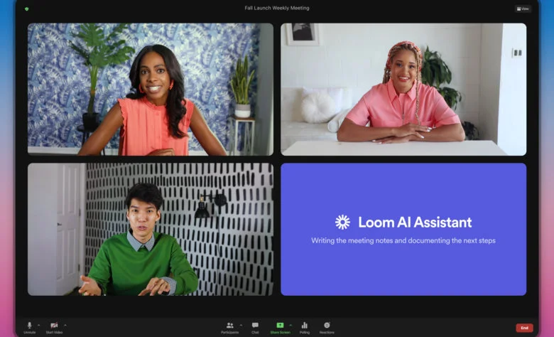 Screenshot of a virtual meeting with three participants and one shared screen. The top two participants are women smiling and seated in well-lit rooms, while the bottom left participant is a man in a green sweater speaking. The bottom right tile displays a purple slide that reads, “Loom AI Assistant — Writing the meeting notes and documenting the next steps.”