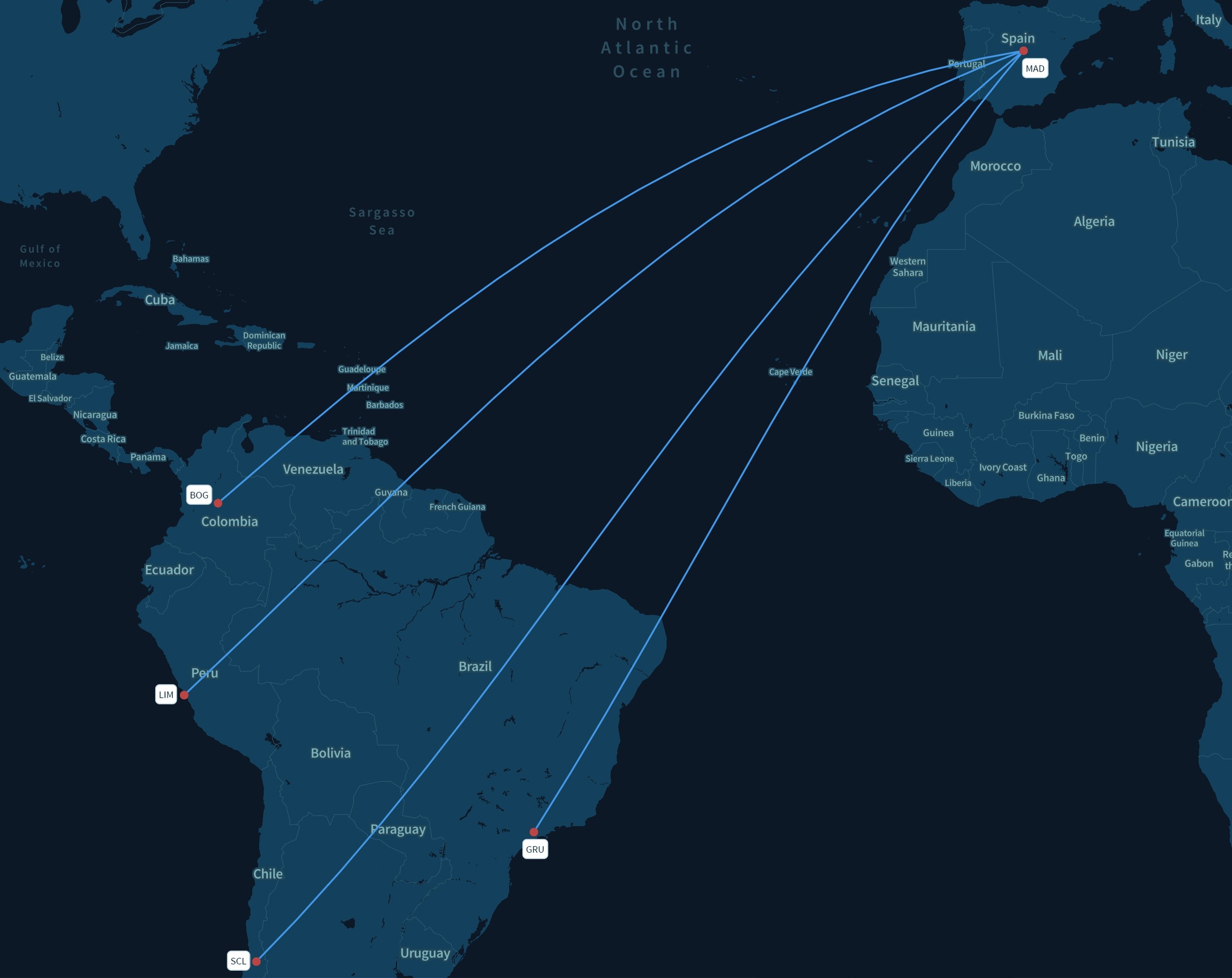 Woman logistics manager using a tablet in a busy warehouse.