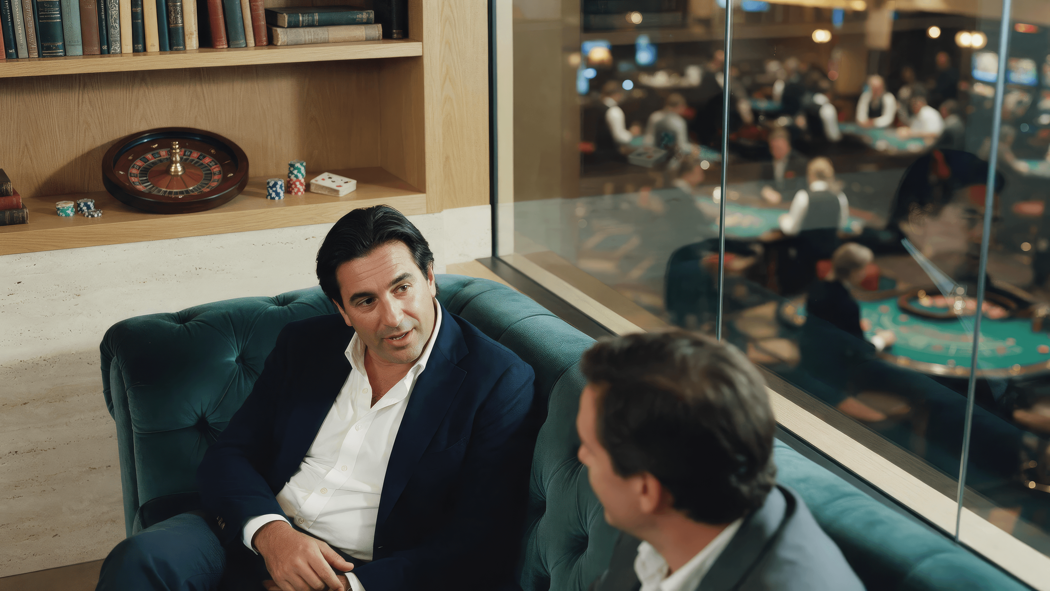 Two BTG977 executives in a lounge overlooking a casino floor