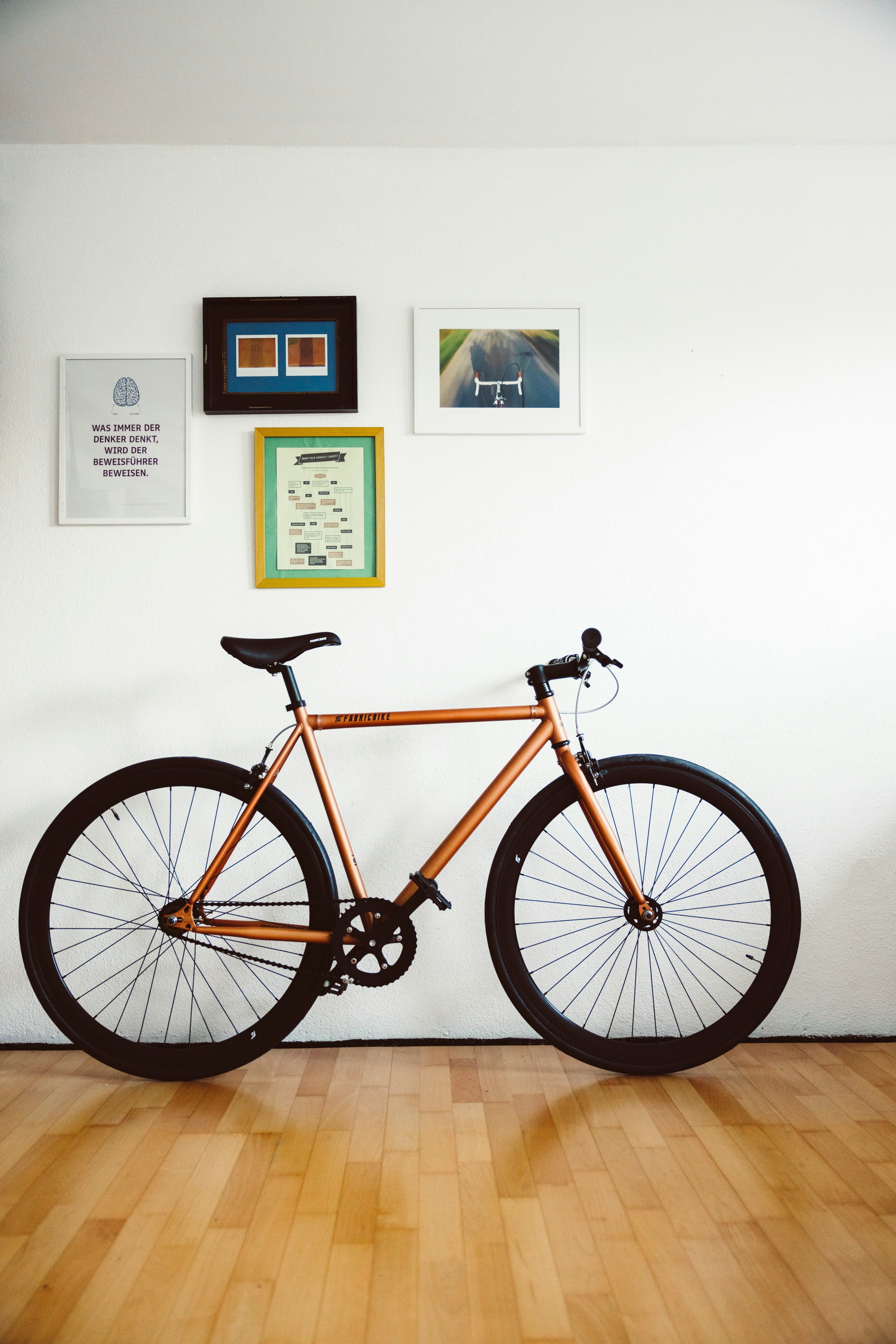 a bike parked against a wall in a room