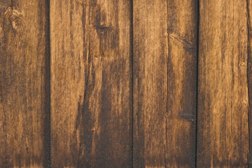 brown wooden door with silver door knob