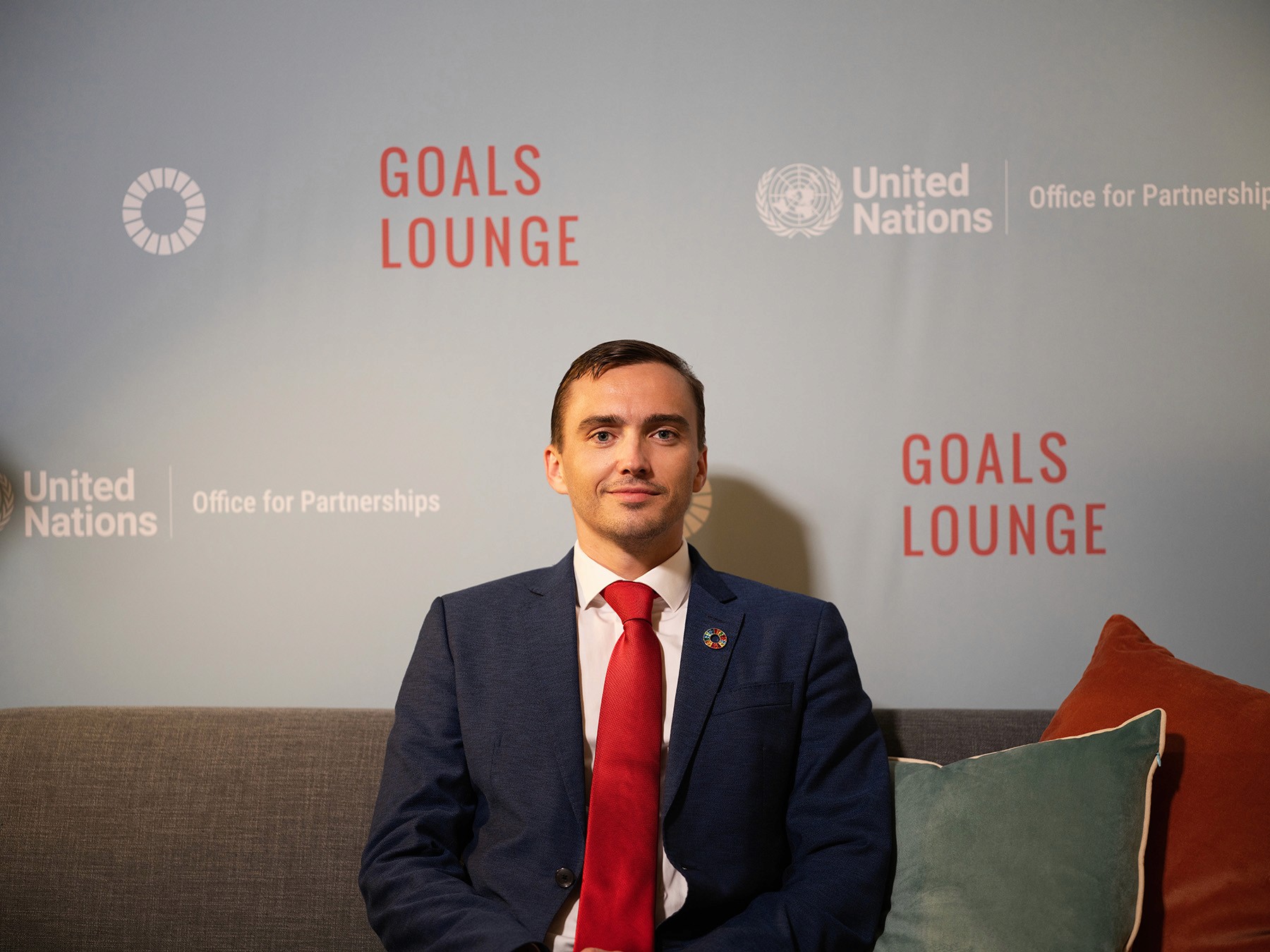 Faces of Impact Founder Artem Shestakov at the UN Office of Partnerships Goals Lounge during UNGA 80 at UN Headquarters.