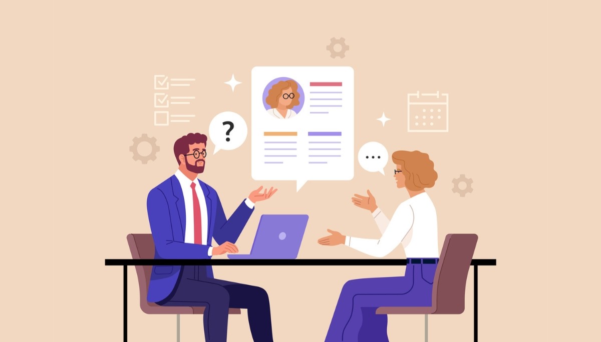 Illustration of a professional job interview with two people seated across a desk, surrounded by icons for resumes, calendars, and evaluation tools—representing effective interviewing techniques to identify top talent.
