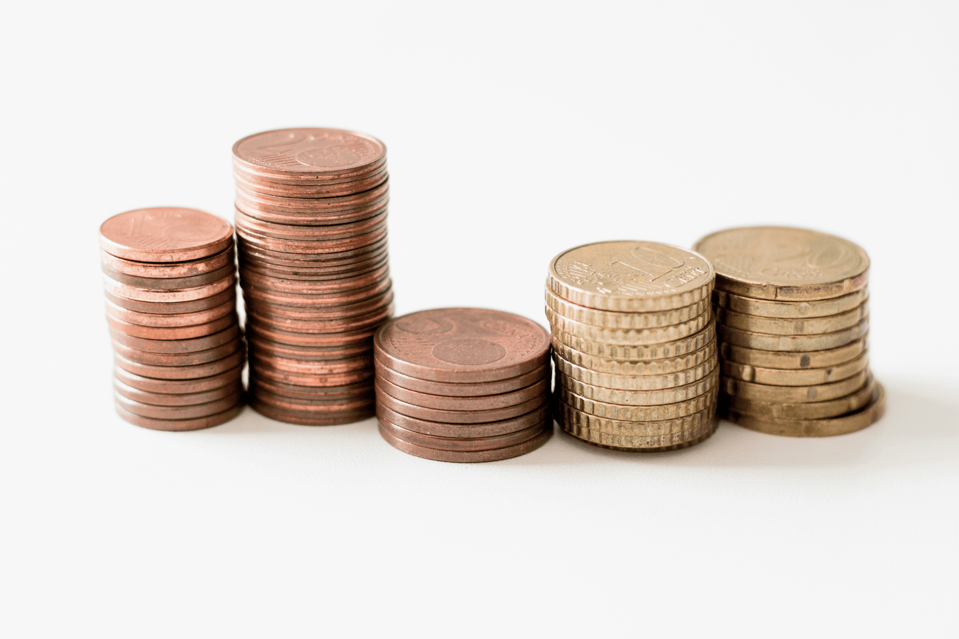 Five piles of coins