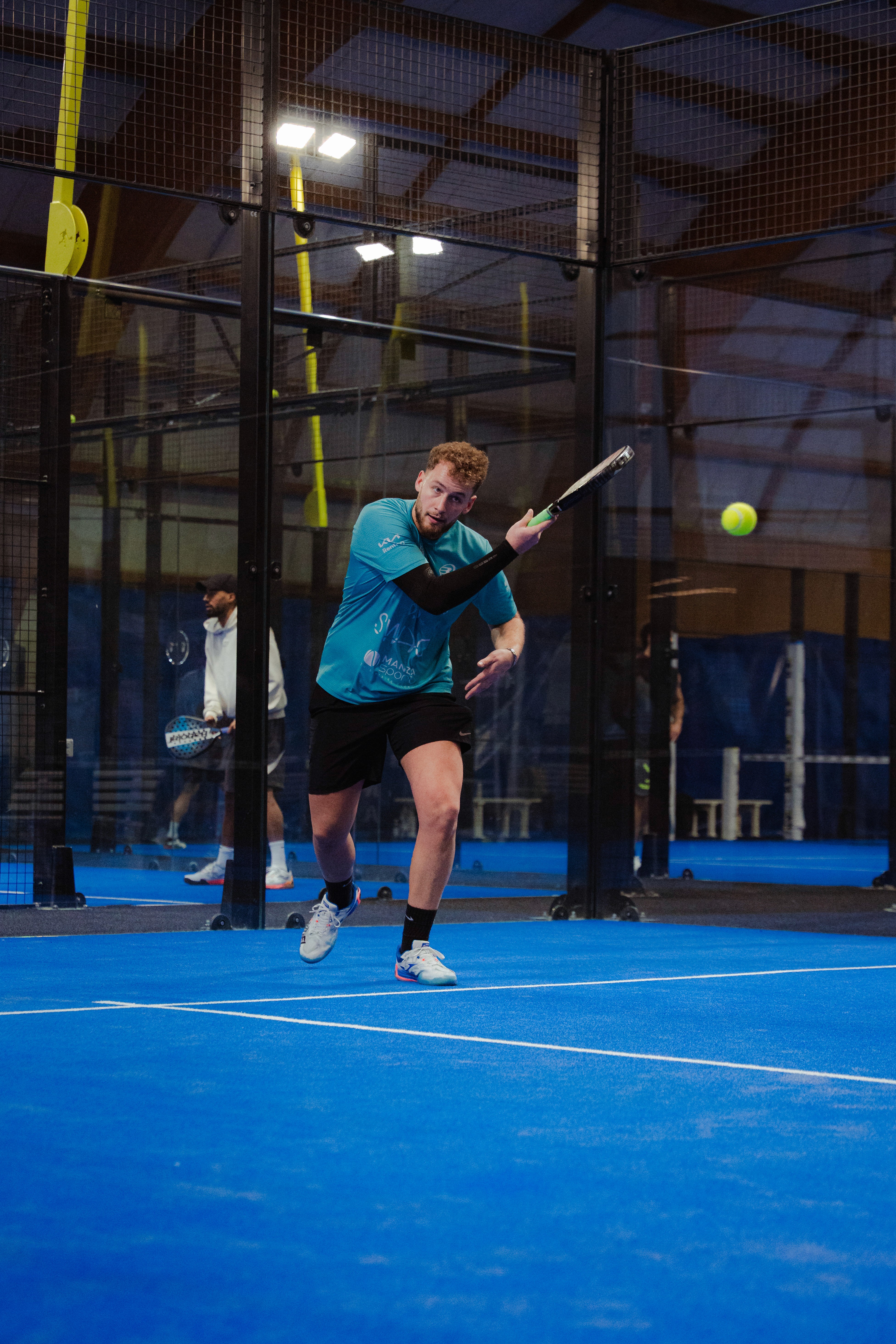 A man playing padel