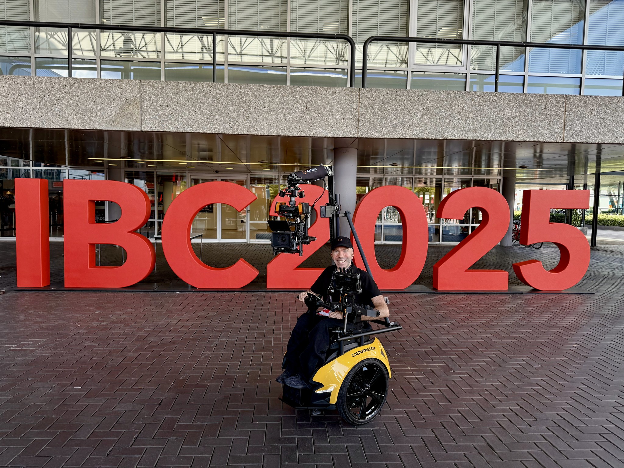 Letterbox image of part of the DMM studio, showing seating of the Podcast space