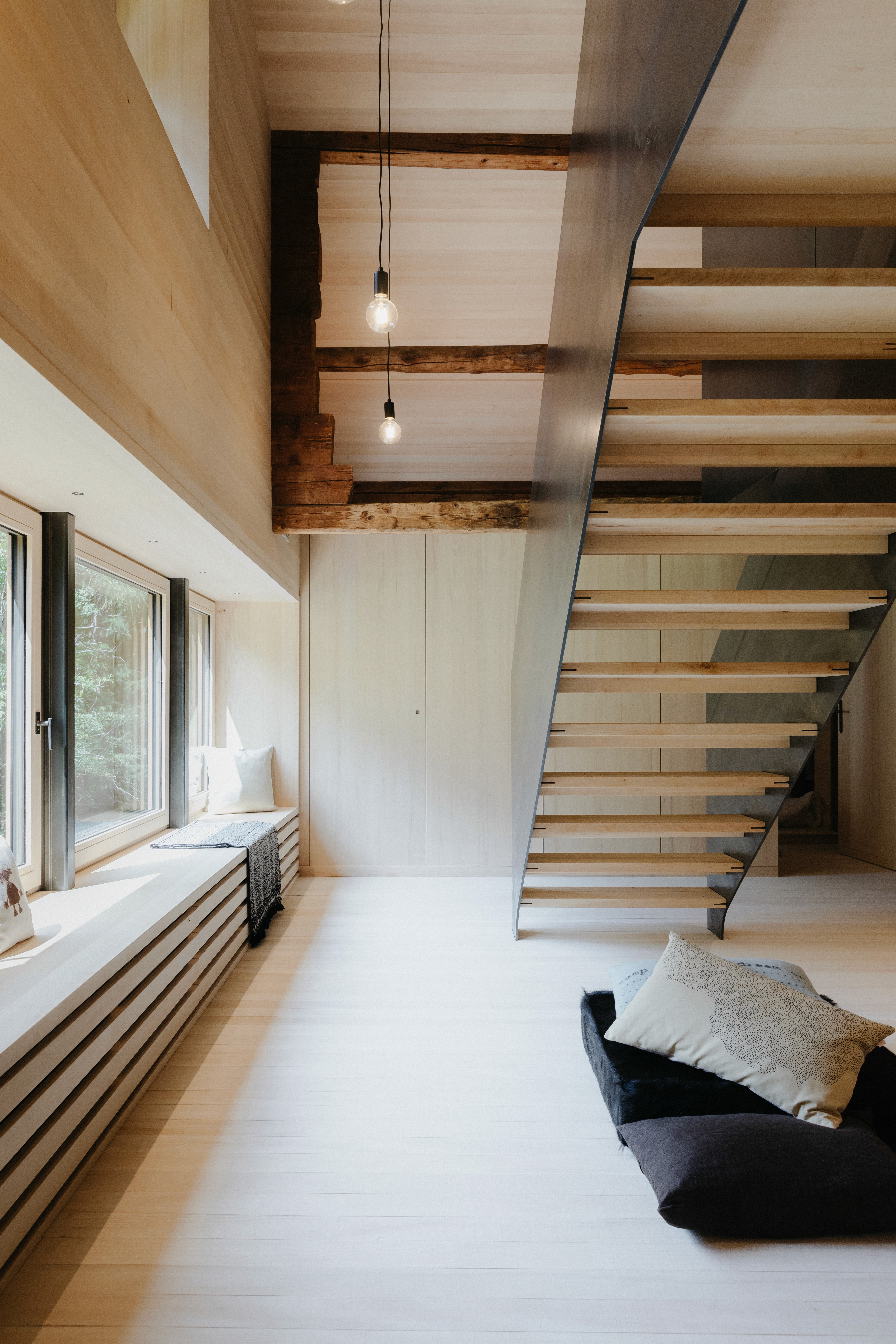 Wooden staircase with metal frame.