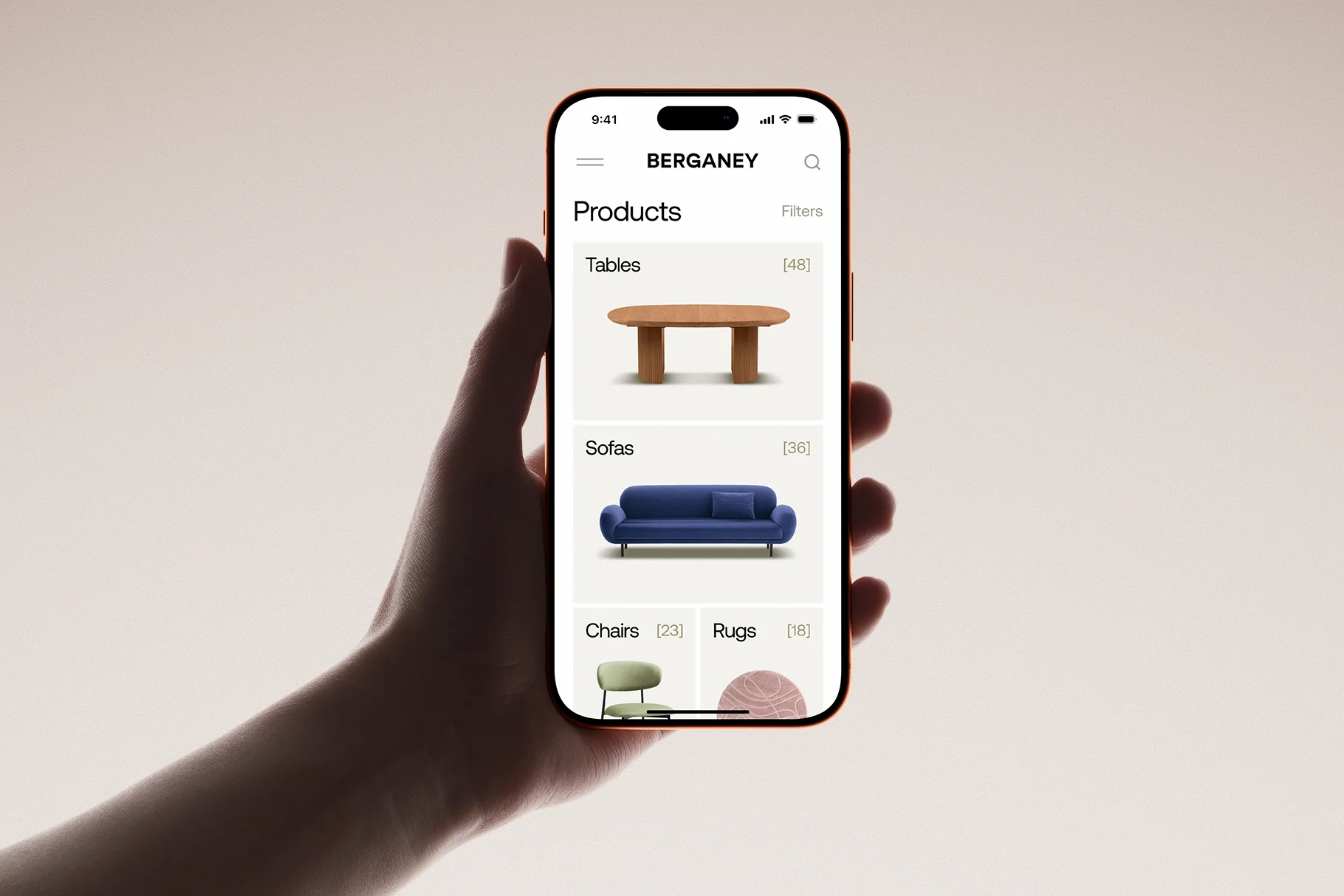 Hand holding an iPhone 17 Pro mockup displaying a furniture store app interface against a light beige background.