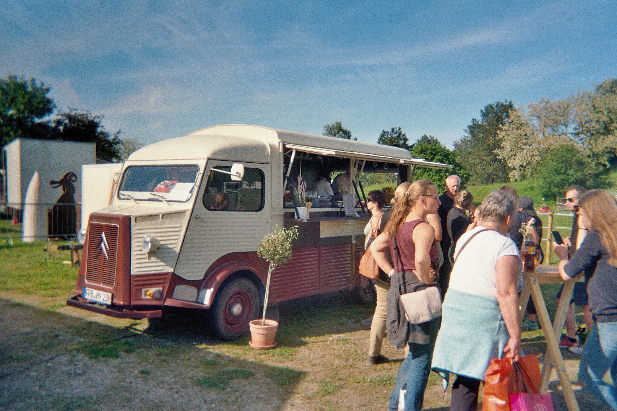 man in gray suit and woman in white wedding dress