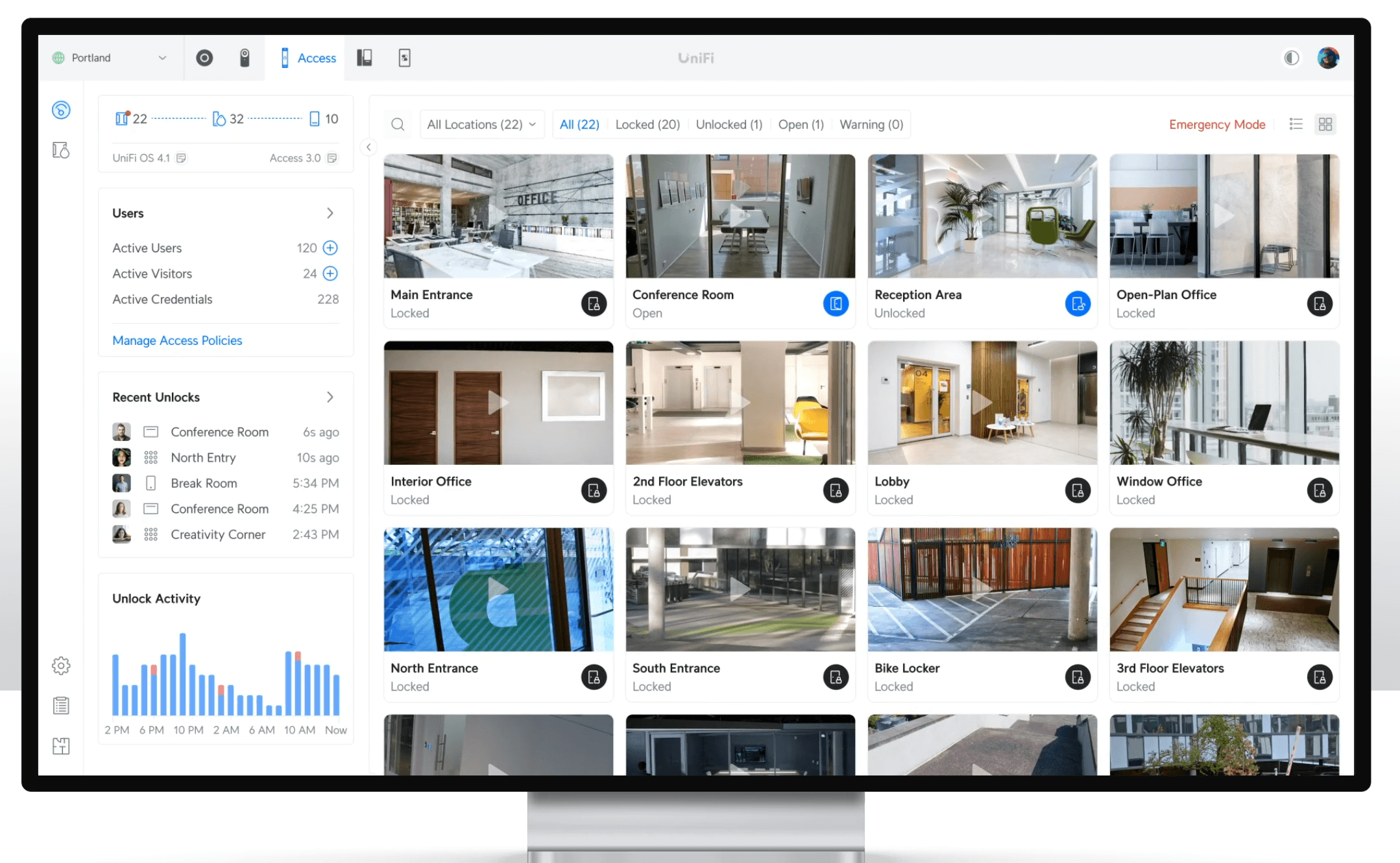 Close-up of lush, dark green leaves, some glossy and wet, against a muted background.