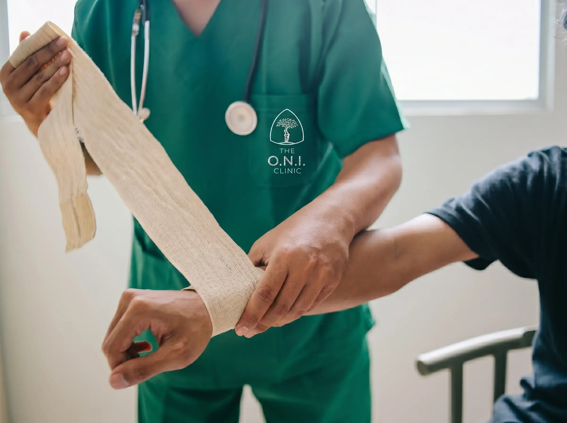 Medical Professional Wraps Bandage on Patient's Arm