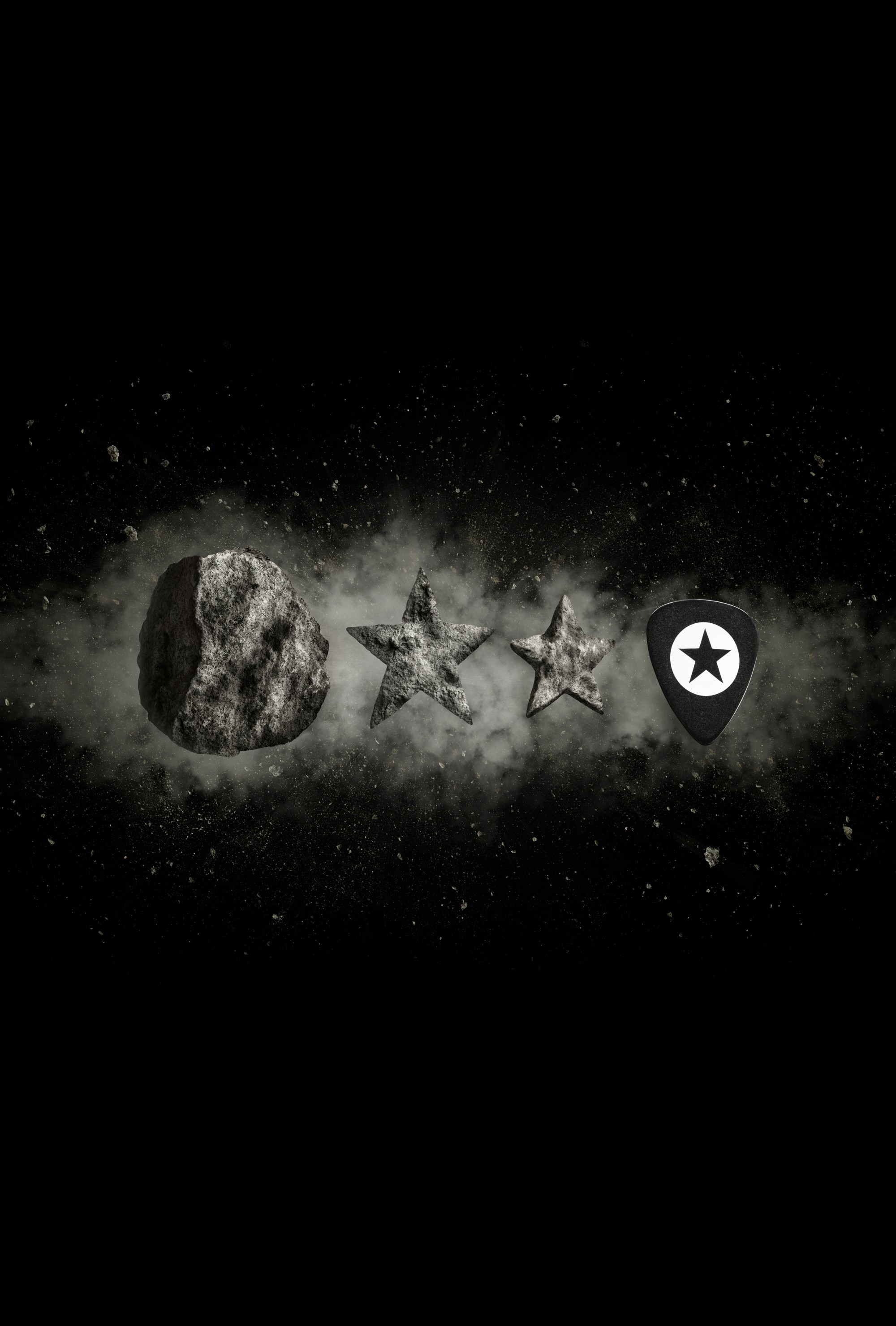 An explosion of dust and debris with three rocks transitioning into a guitar pick