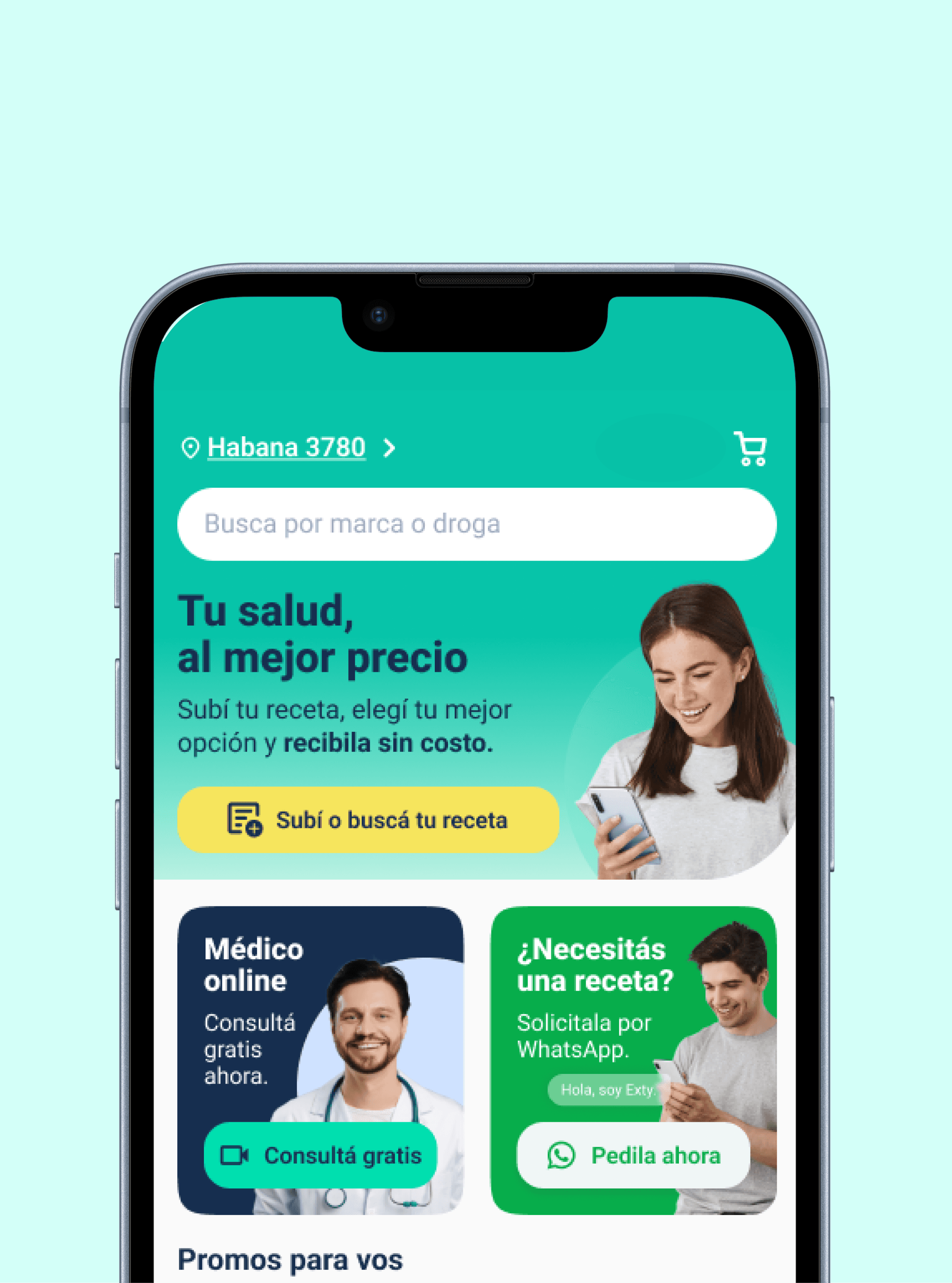 Smiling young man with short hair poses against a dark background, wearing a green button-up shirt.