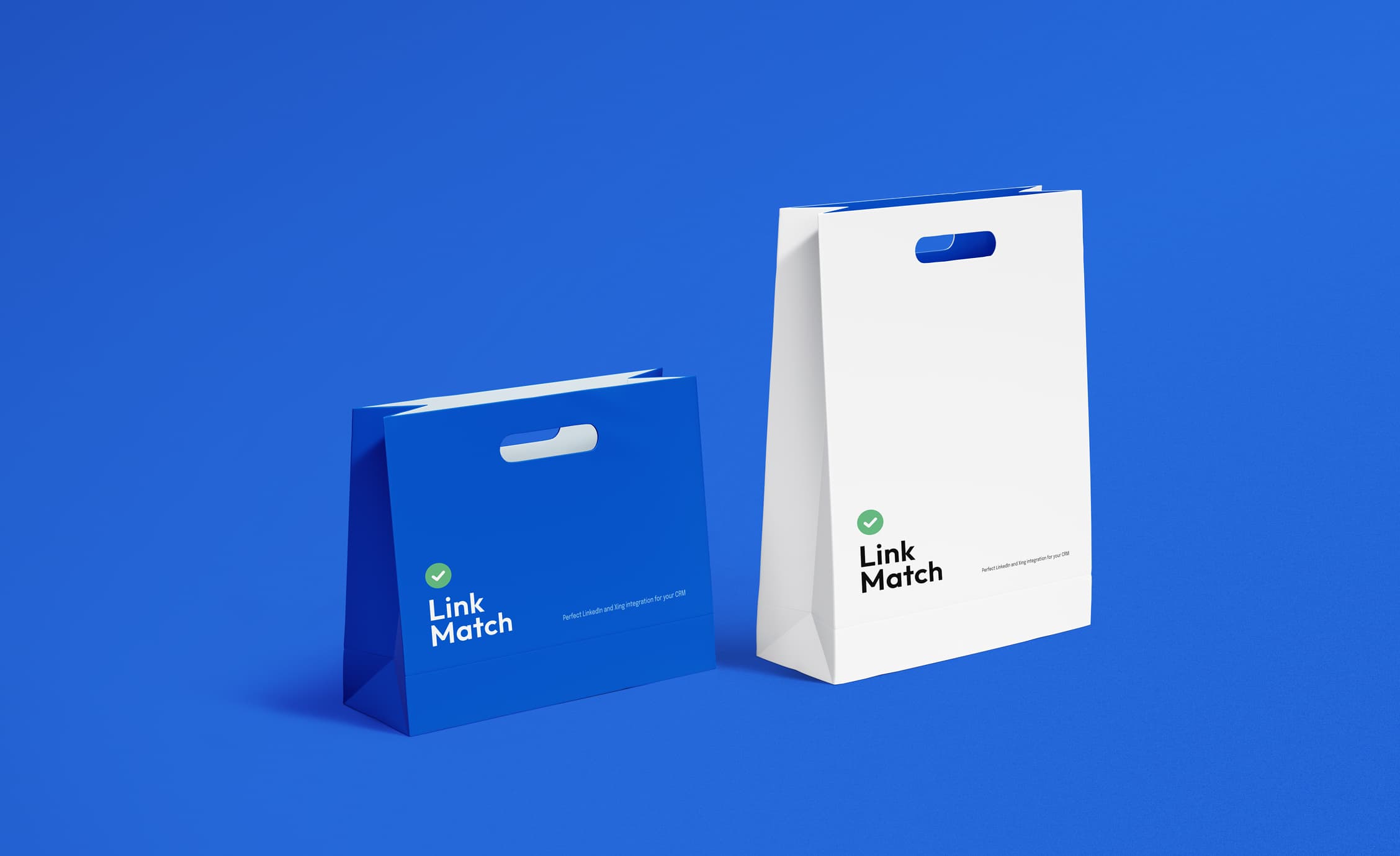 LinkMatch promotional shopping bags in blue and white with company logo