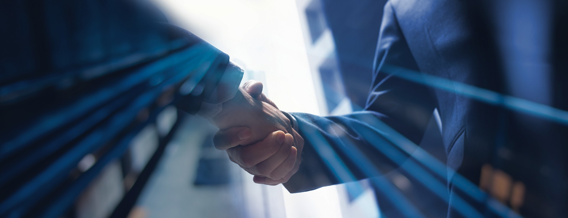 Handshake image on blue background