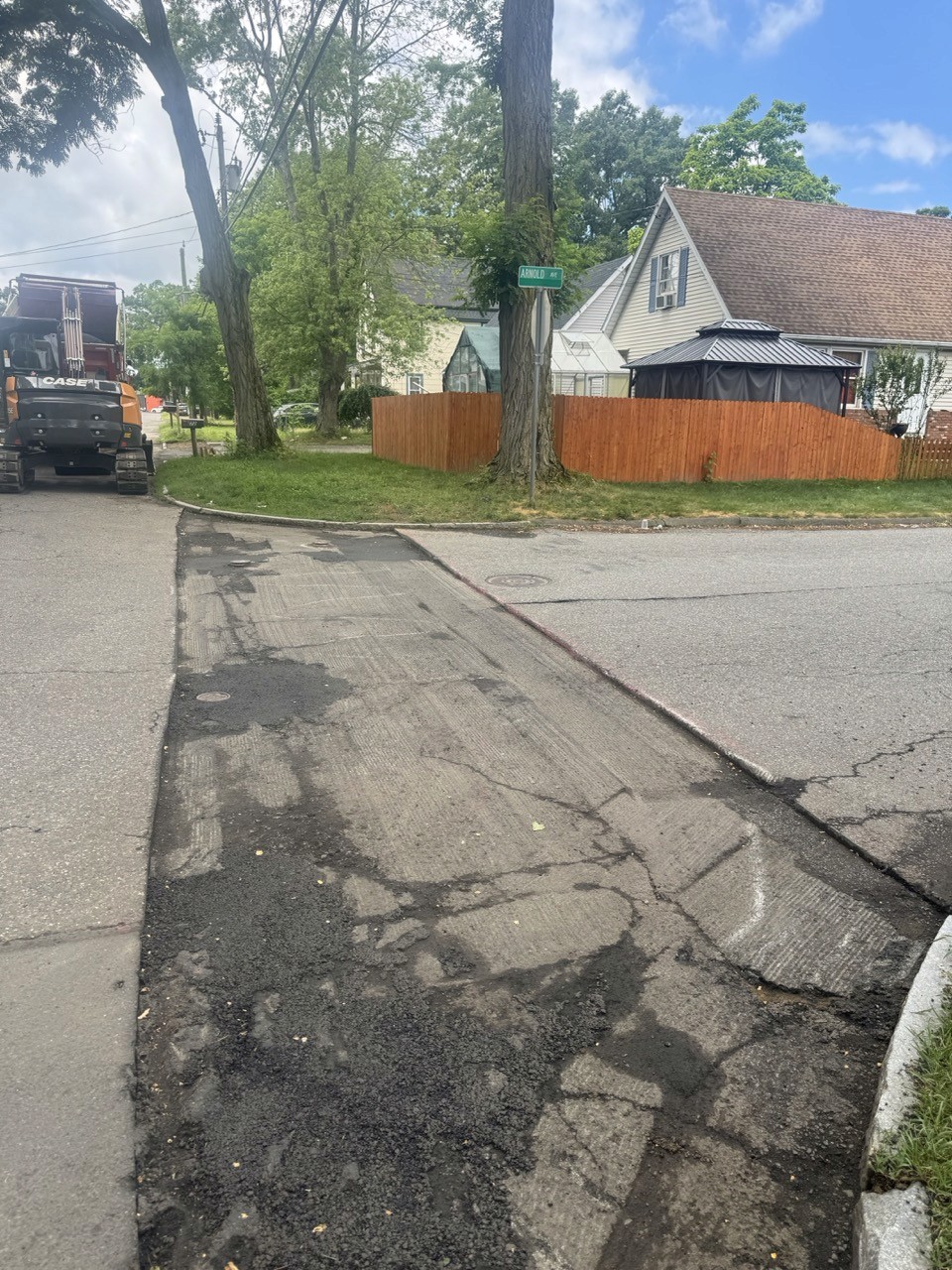 Neat trench restoration snaking through an intersection, by A&M Construction Enterprises