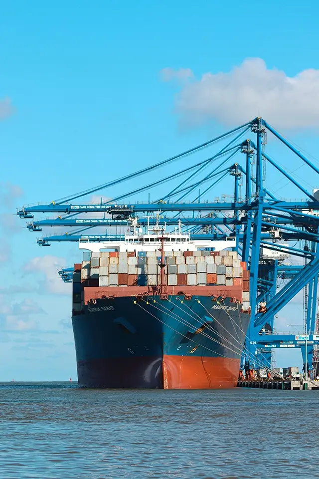 Shipping conyainer ship docked at a shipping port
