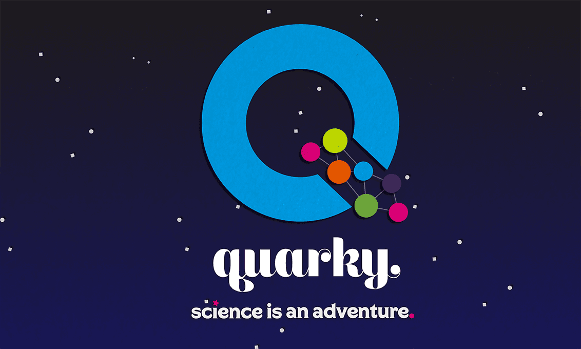 A dark blue background with scattered white dots features a bright blue circle. Inside the circle are four colorful circles connected by thin lines. Below the graphic, the word “quarky.” is written in white, followed by the phrase “science is an adventure.” in smaller white text.