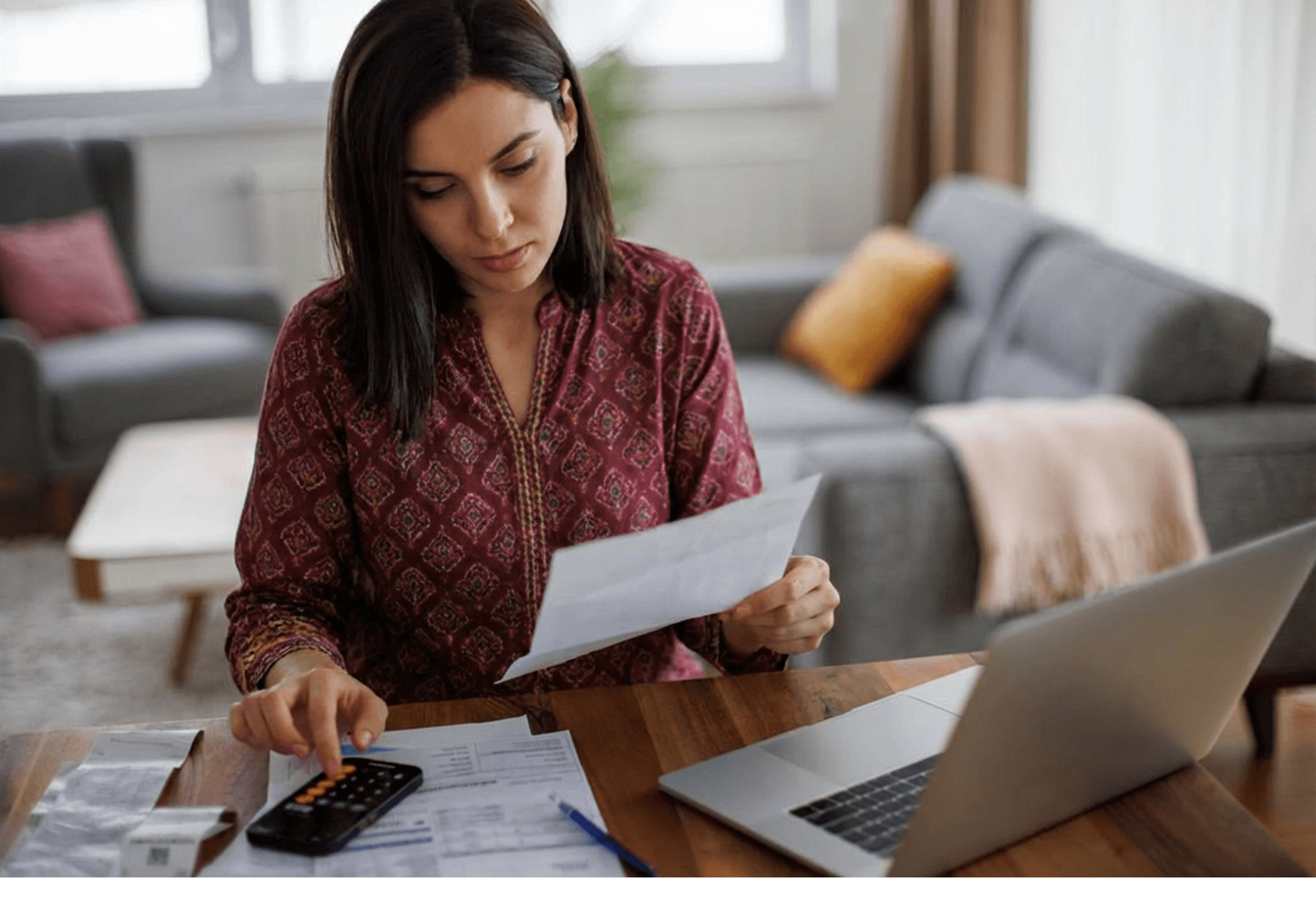 A young Pakistani female managing paperwork