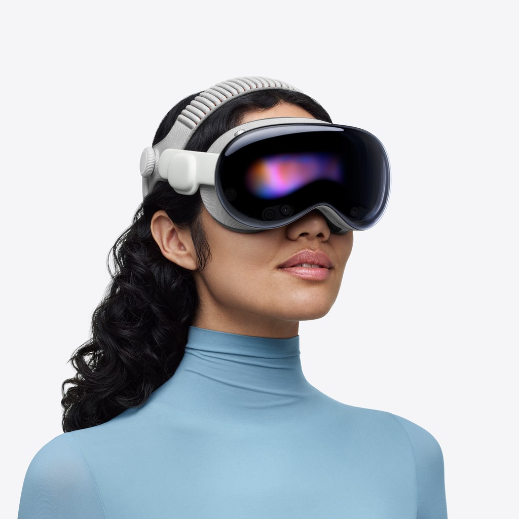 The 11-inch and 13-inch iPad Pro, space black 14-inch MacBook Pro, and the new Apple Vision Pro with the Dual Knit Band.