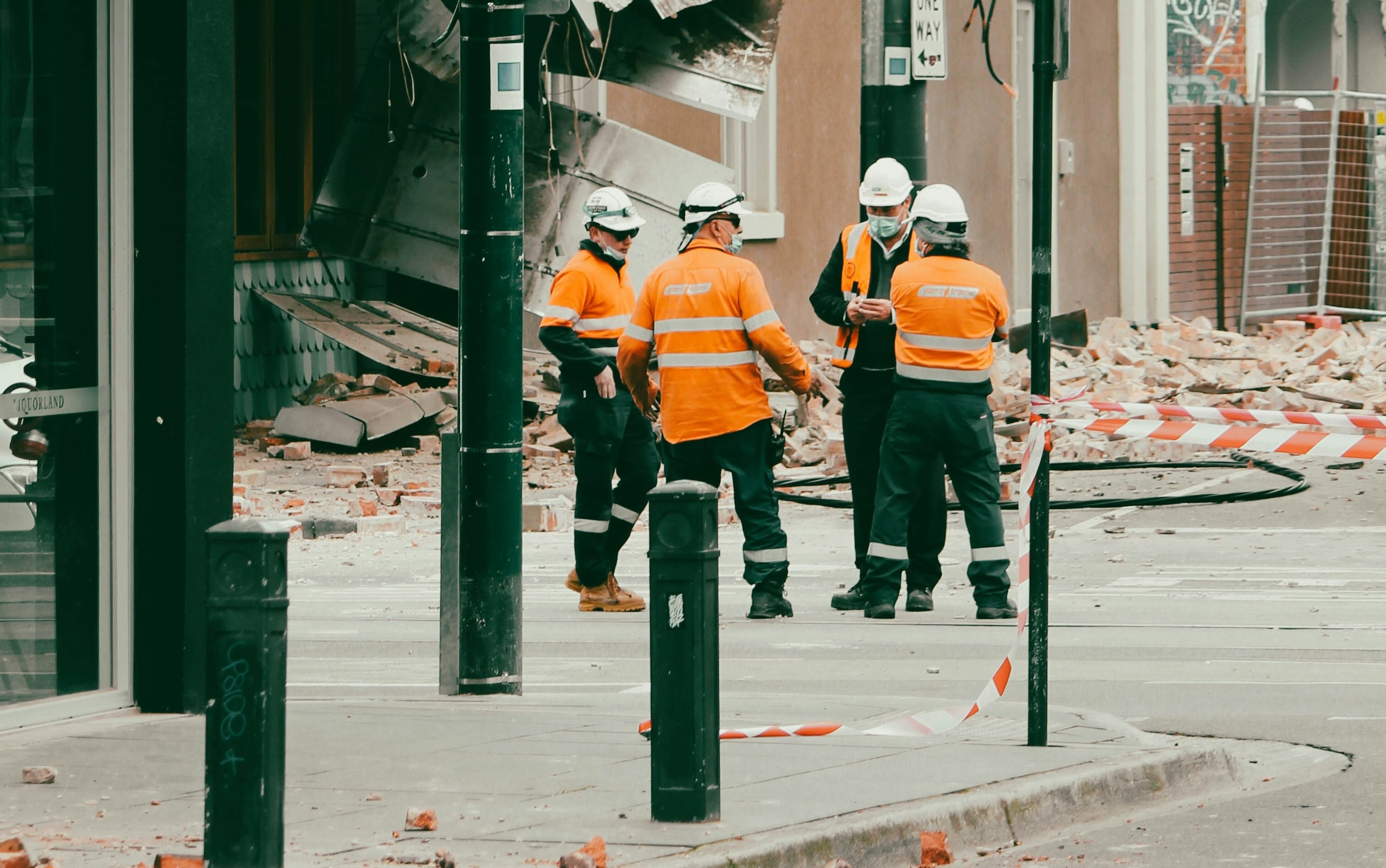 constuction workers standing in a group discussion