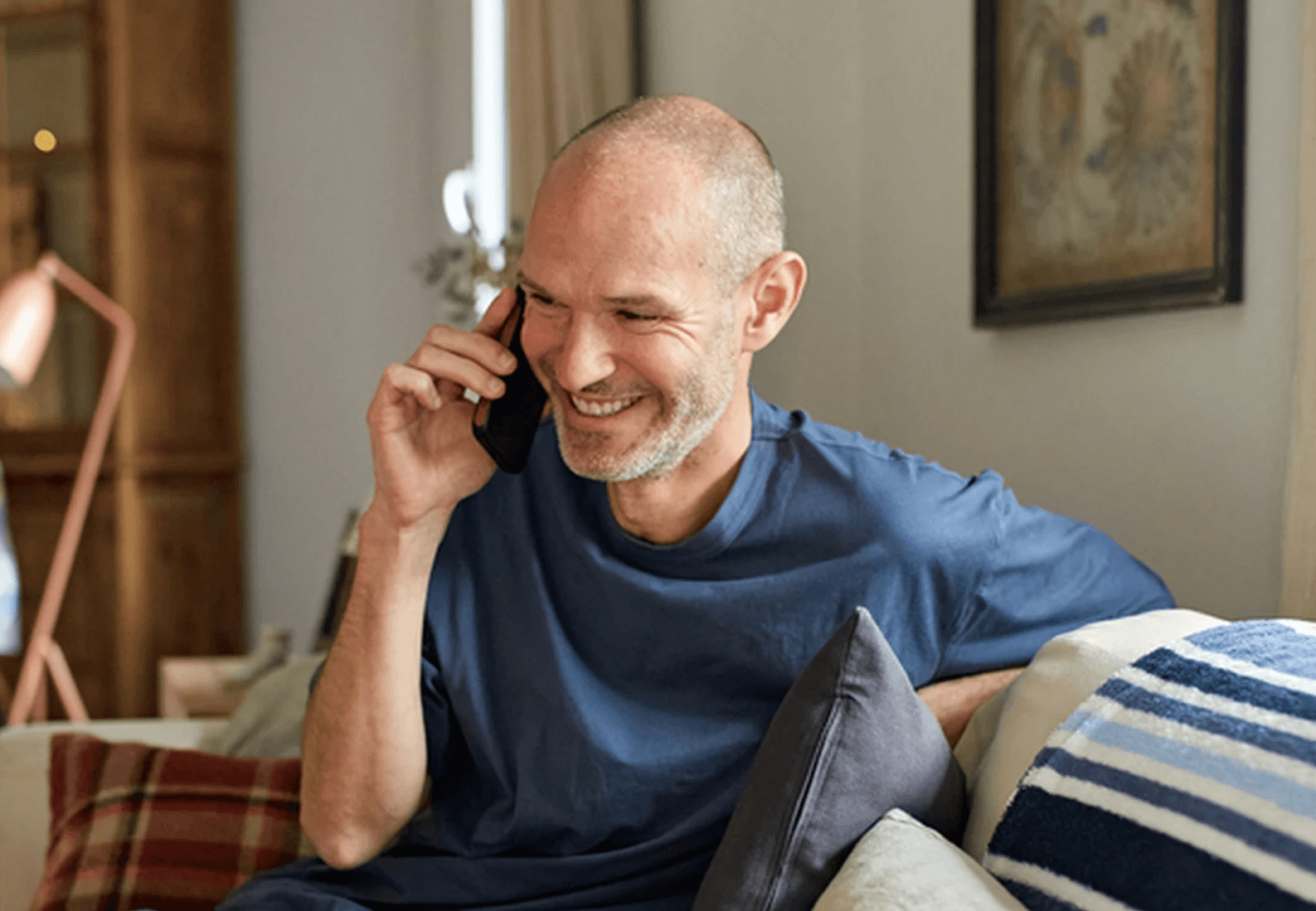 Man making a telehealth phone call