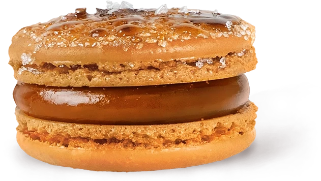 Caramel à l’Ancienne macaron with browned butter and sea salt caramel and dark couveture chocolate.