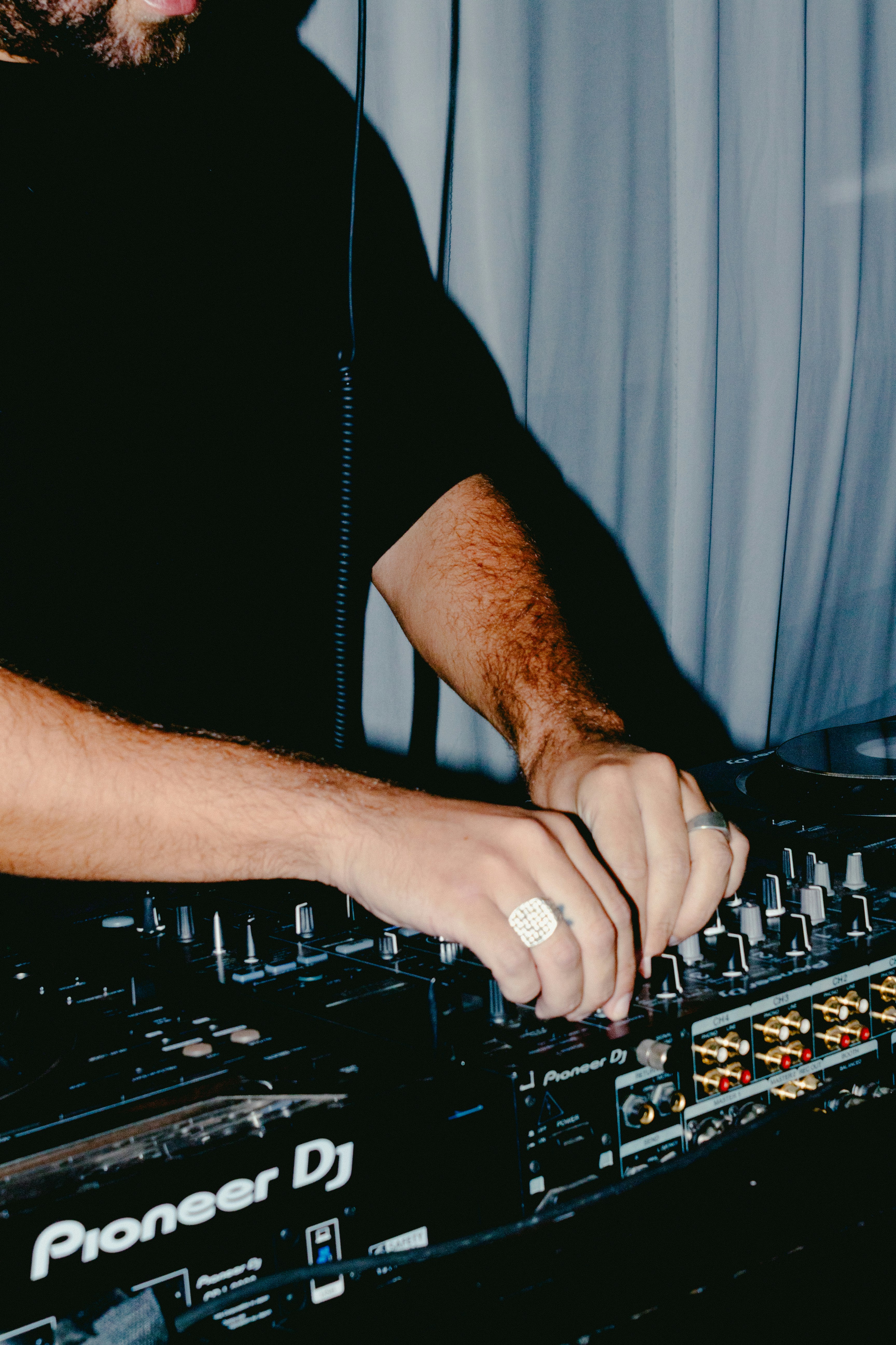 A man getting his hair cut by a woman
