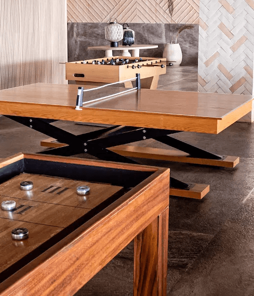 Shared lounge with wooden game tables