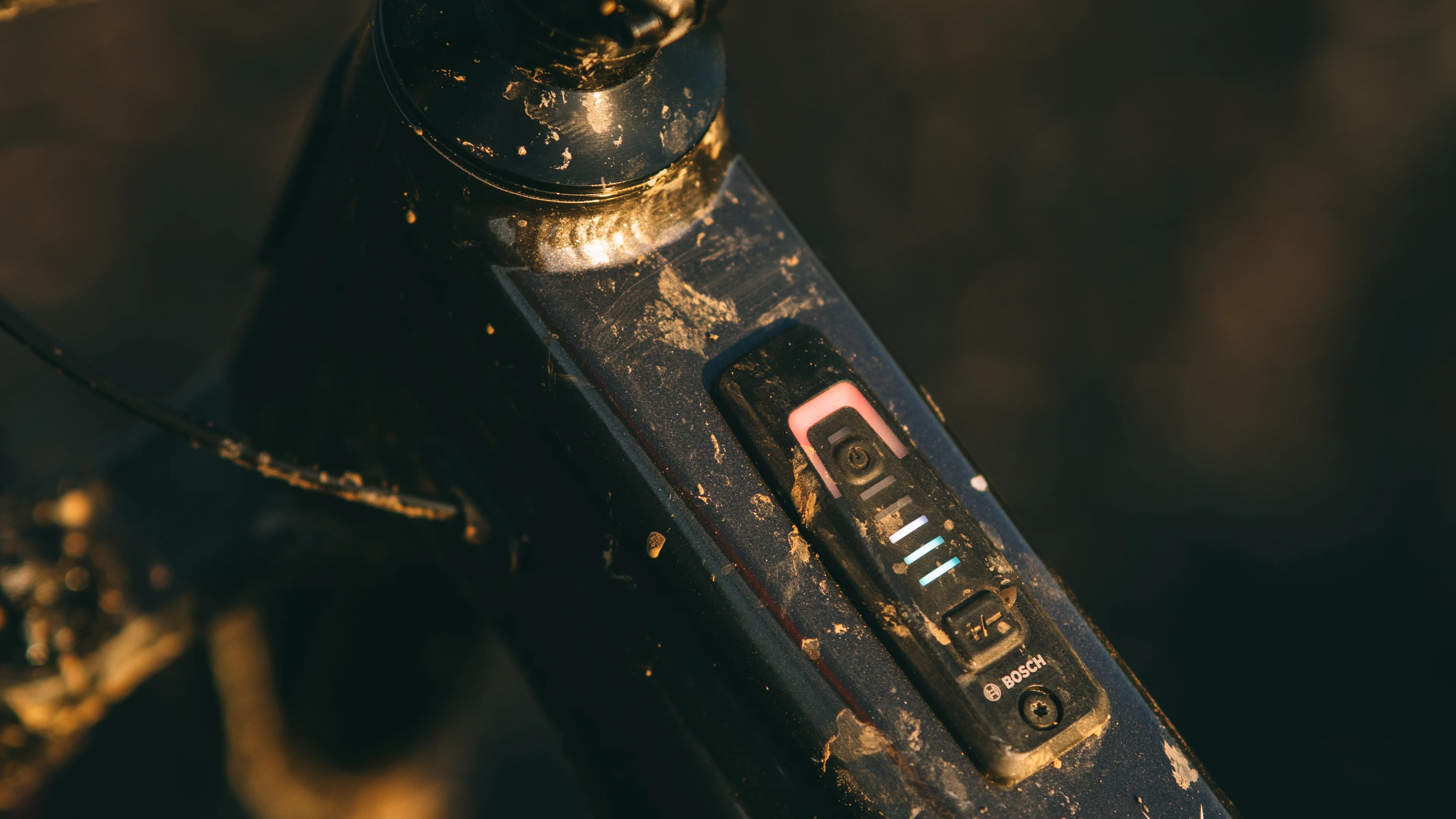 Integrated power and battery-status controls embedded within the Whyte Kado top tube.