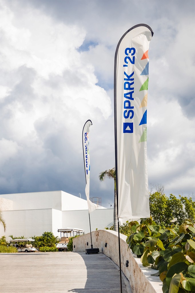 Photo of a flag with SPARK branding. 