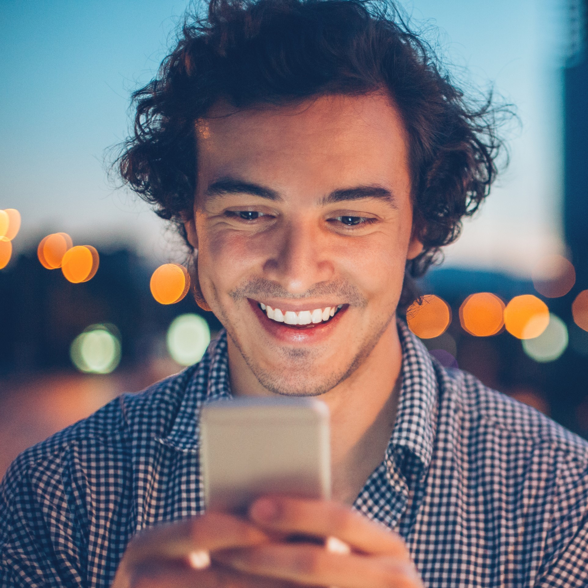 man holding white ceramic teacup