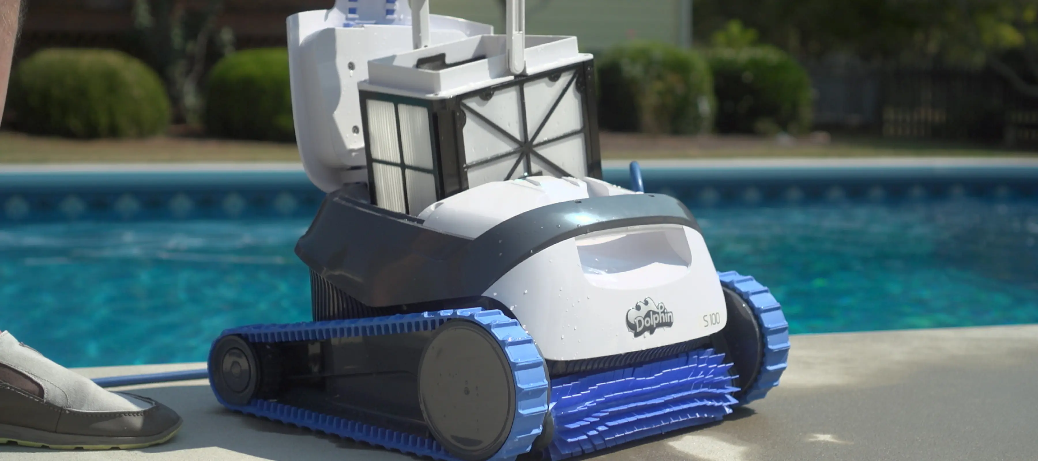 The dolphin s150 product shot next to a pool