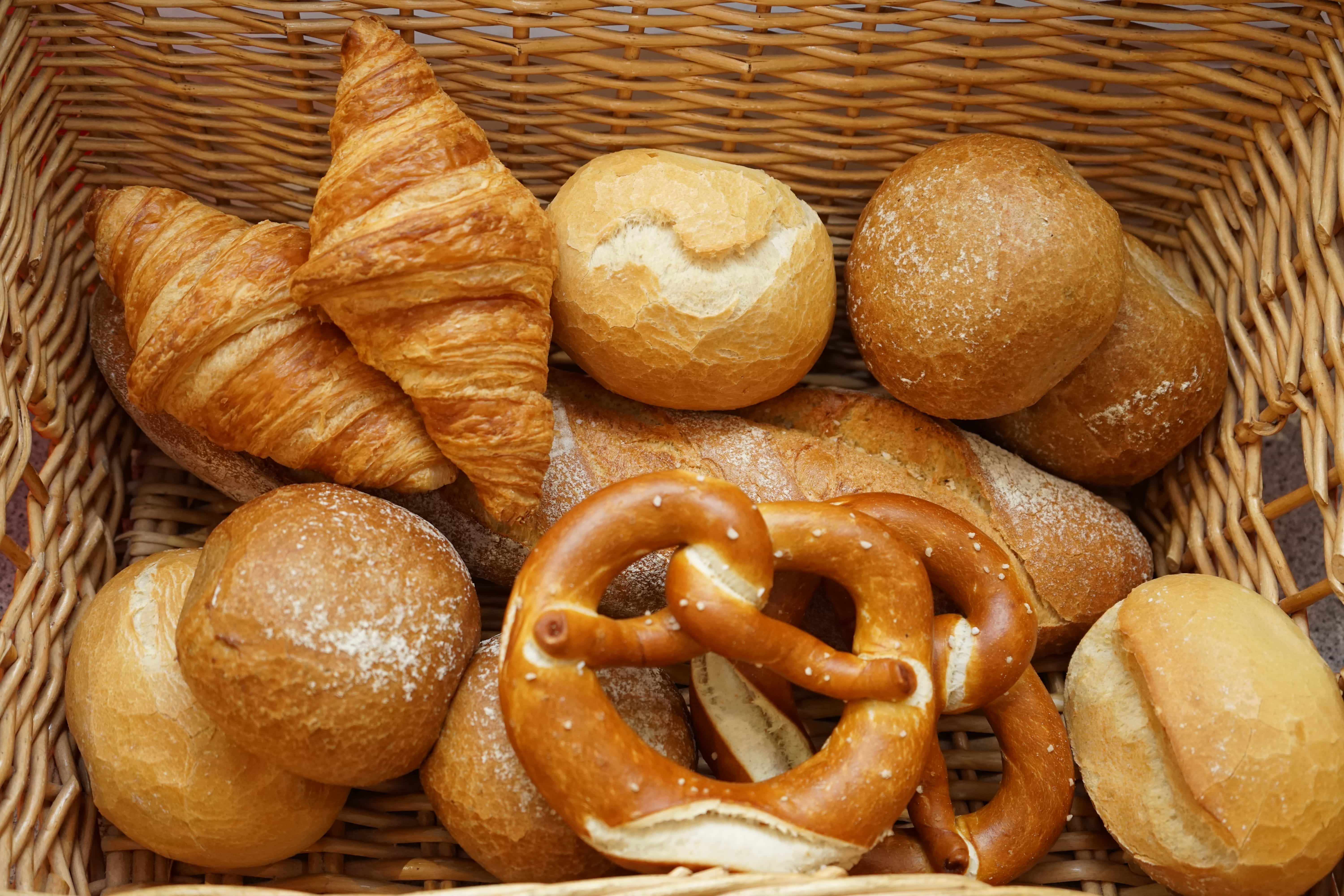 Basket with rolls, pretzels, and croissants