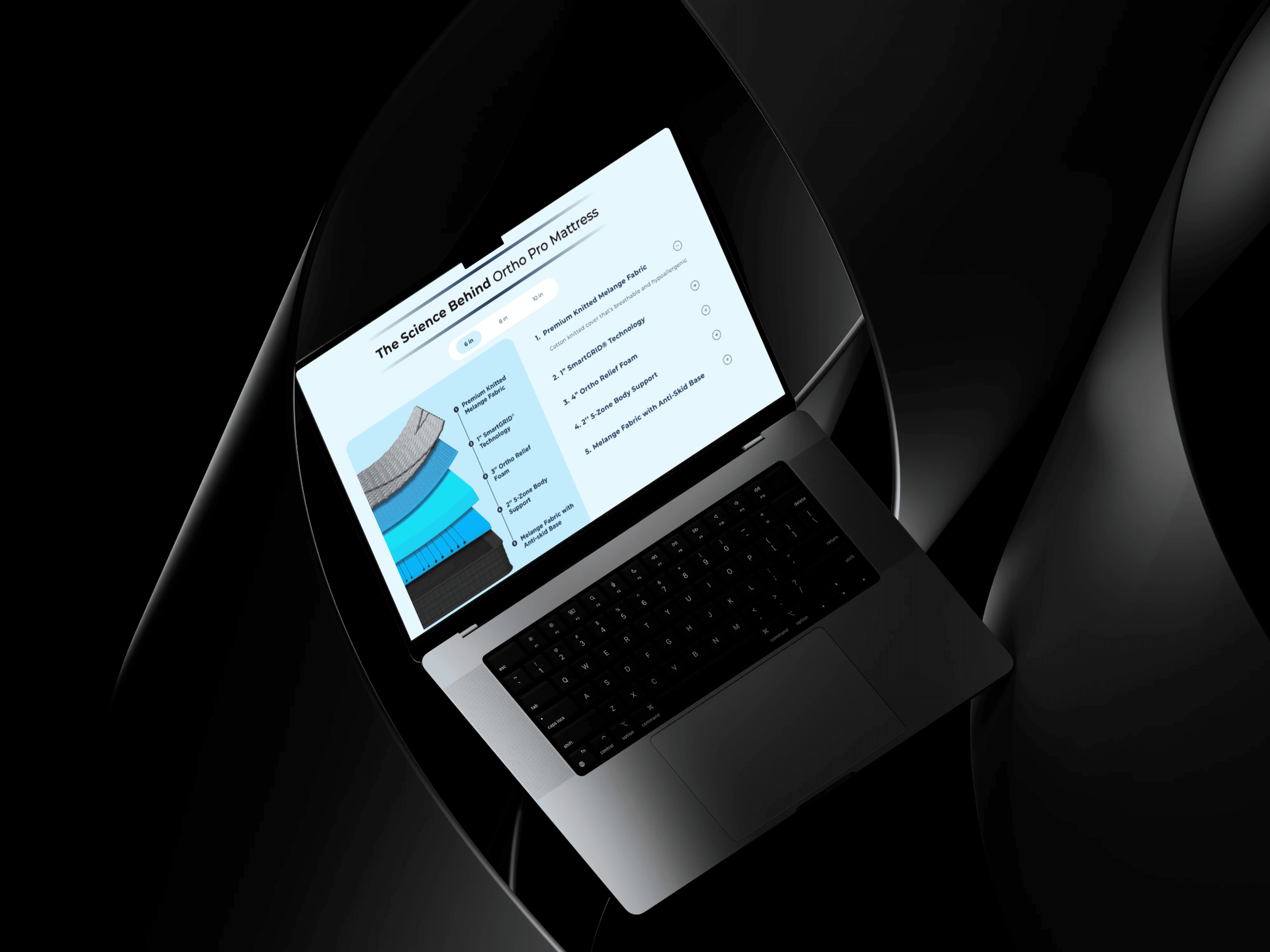 Sleep Company website in mockup macbook