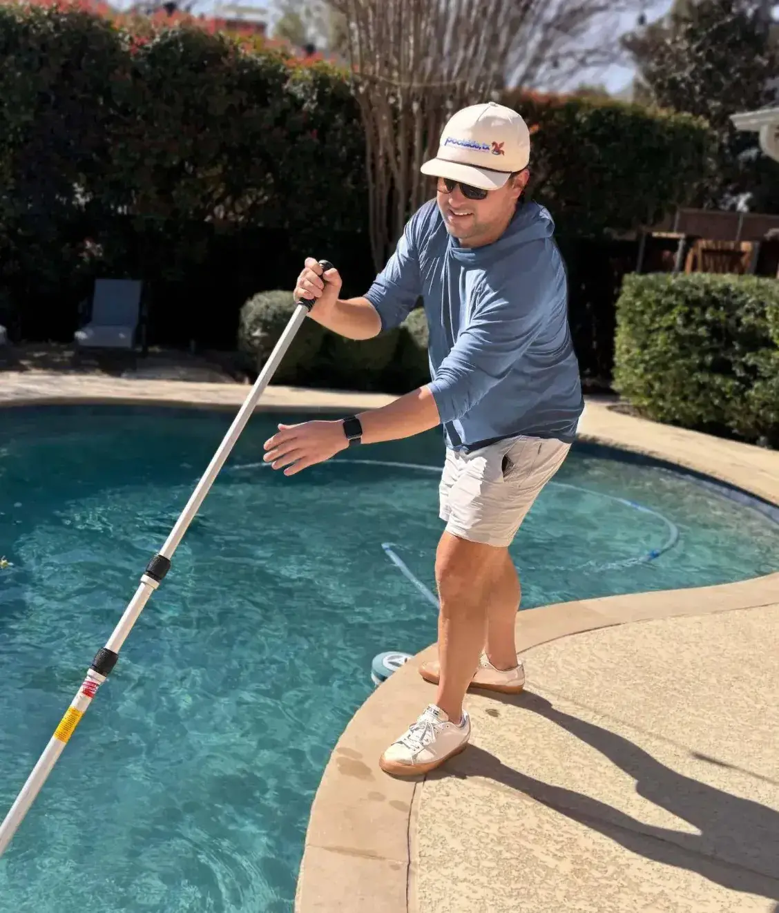 Poolside, TX Owner cleaning a Dallas pool