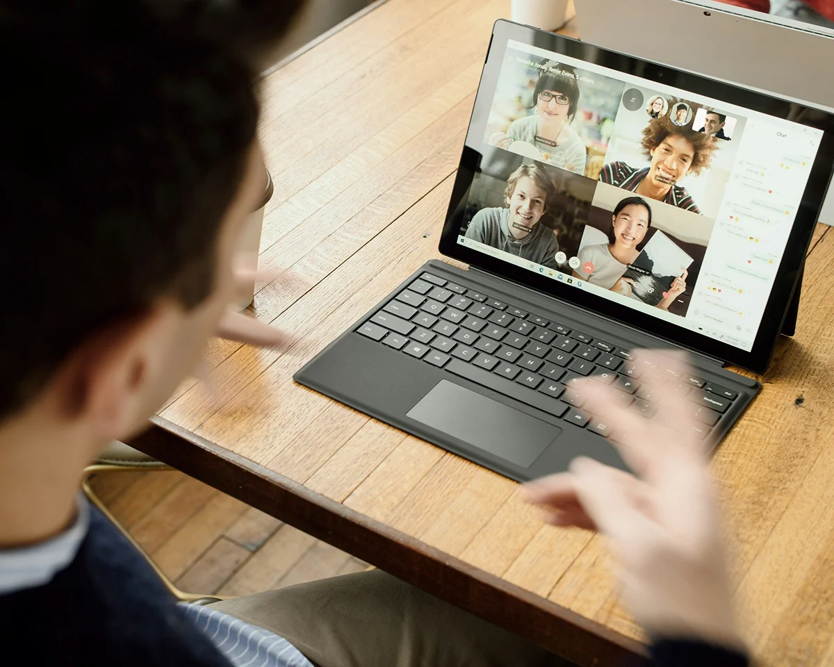 A learner joining a group video call on a laptop.