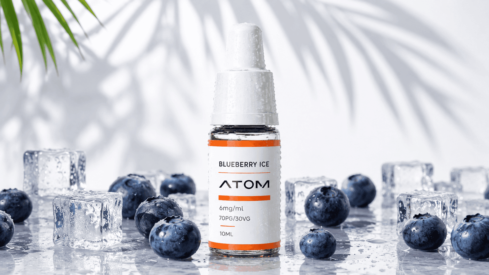 ATOM Blueberry Ice e-liquid bottle with blueberries and ice cubes, highlighting a popular fruit ice flavour for summer.
