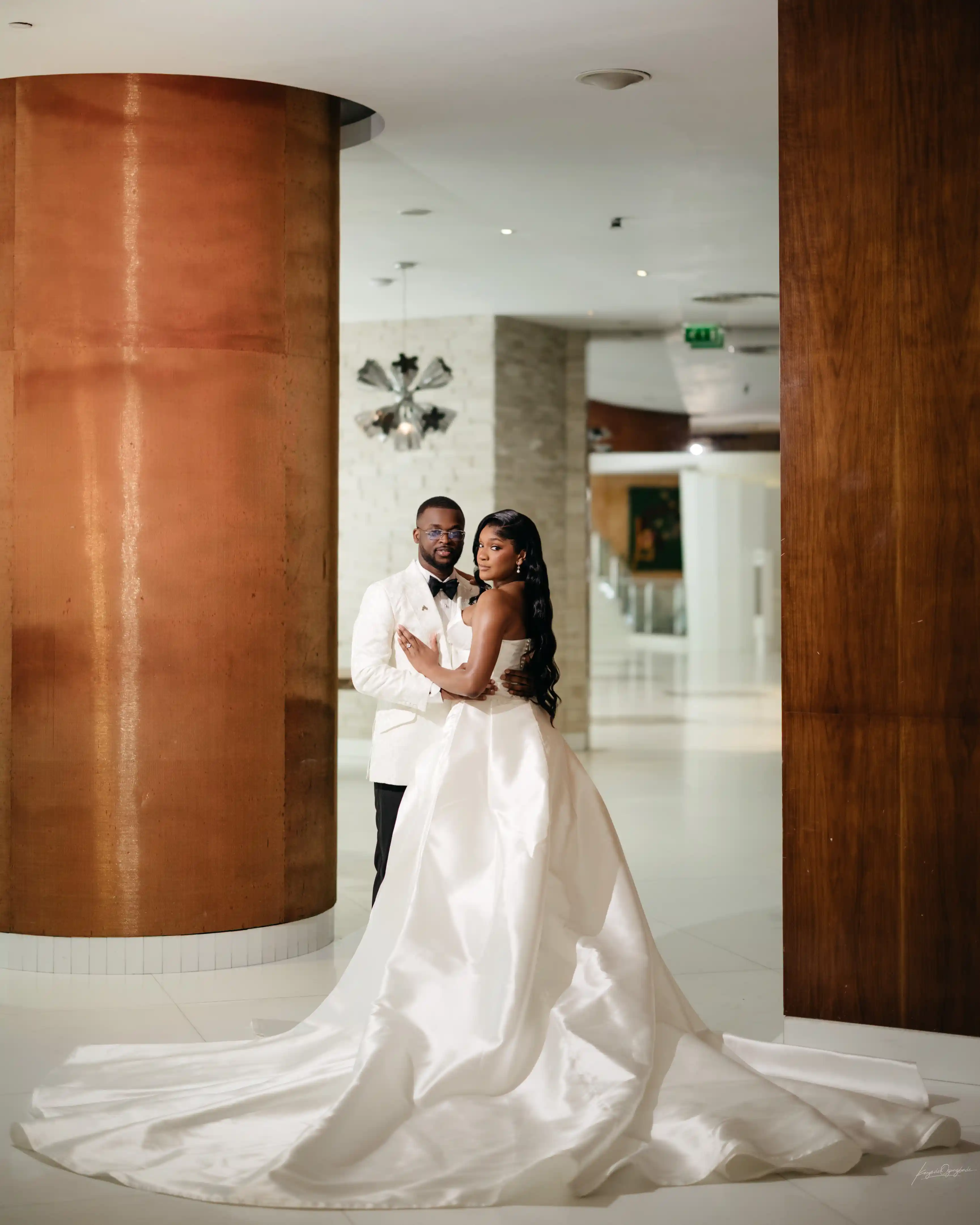 Bride and groom celebrating a luxury wedding coordinated by Victoria Brooks Events, a premium wedding planner in Nigeria.